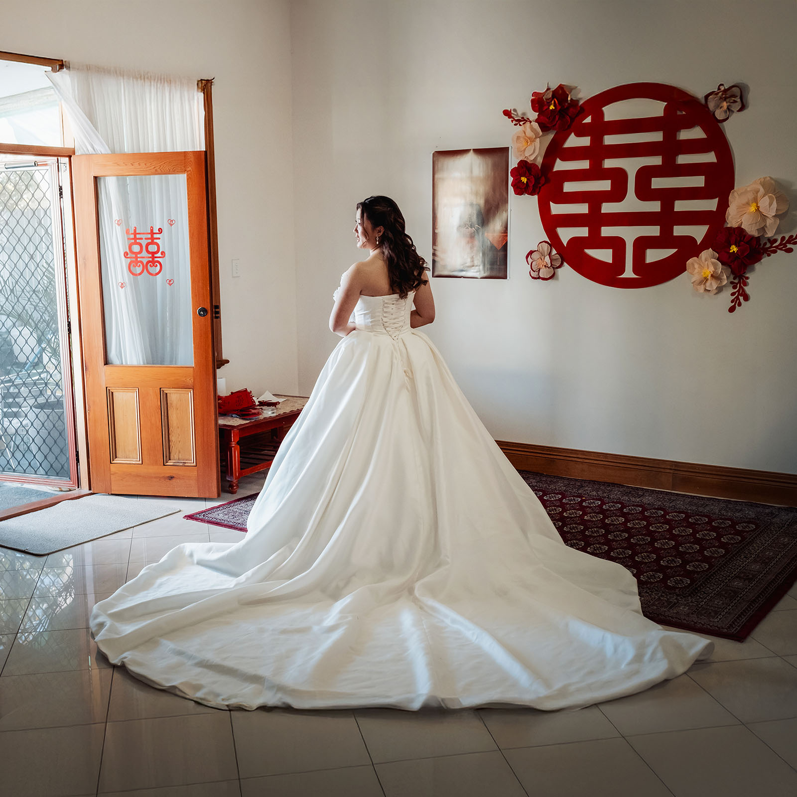 sunnybrae rose garden wedding - celina & anuj 14 Bride wearing a stunning white gown at a wedding ceremony.
