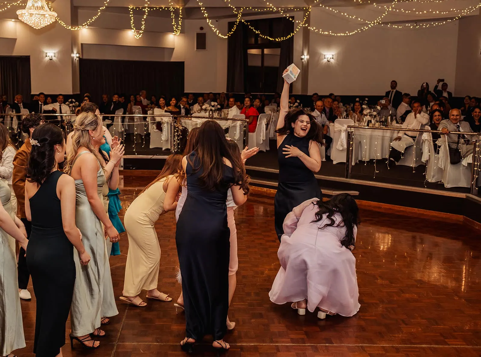 sunnybrae rose garden wedding - celina & anuj 80 Dancers revel in vibrant celebration on the dancefloor.