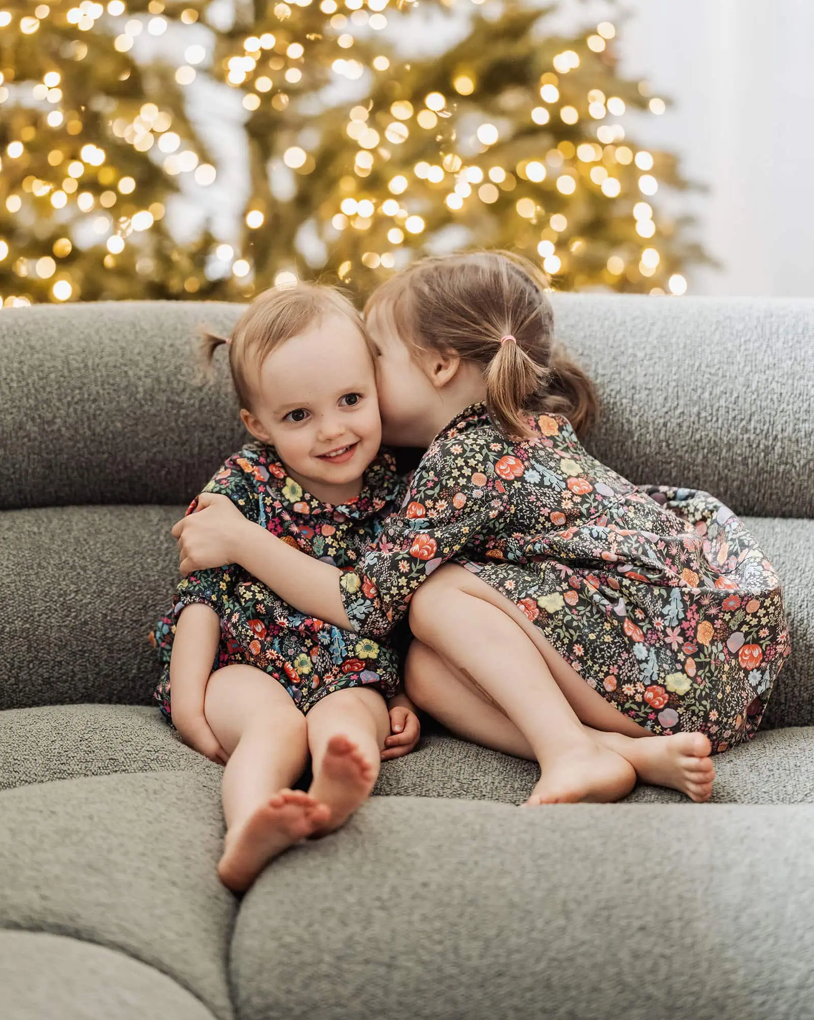 goodwood family photoshoot 112 Children enjoying holiday time together on a cozy couch.
