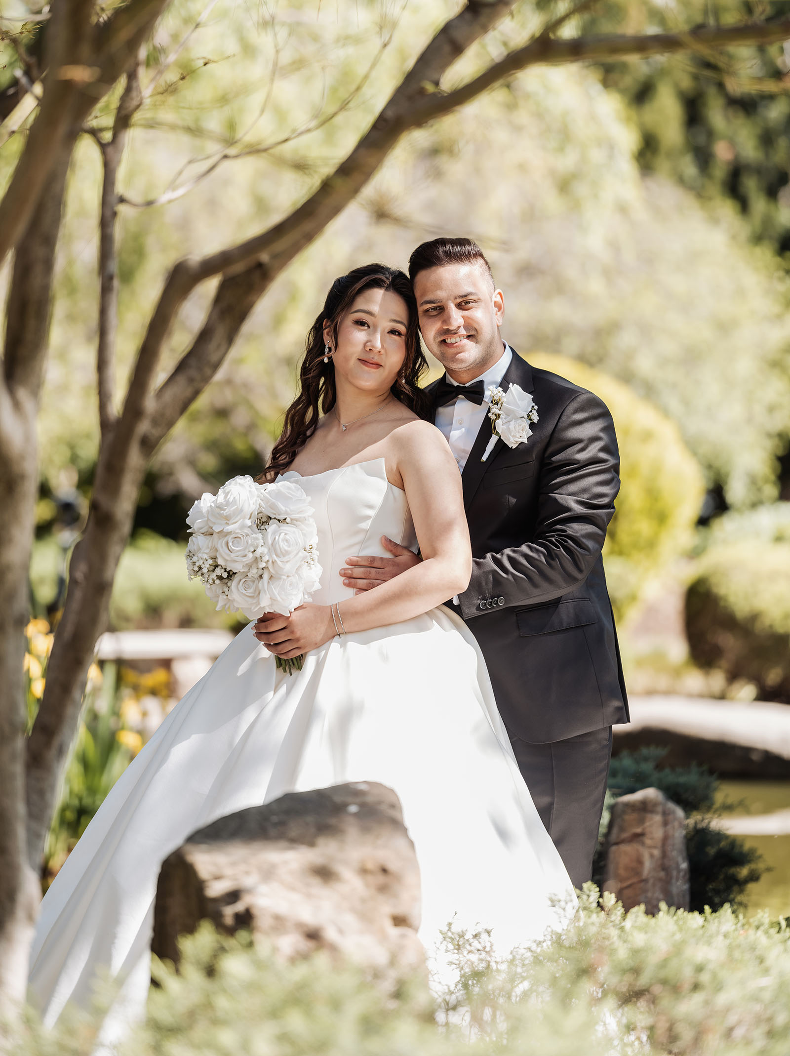 sunnybrae rose garden wedding - celina & anuj 22 Joyful wedding celebration with bride and groom surrounded by friends and family.
