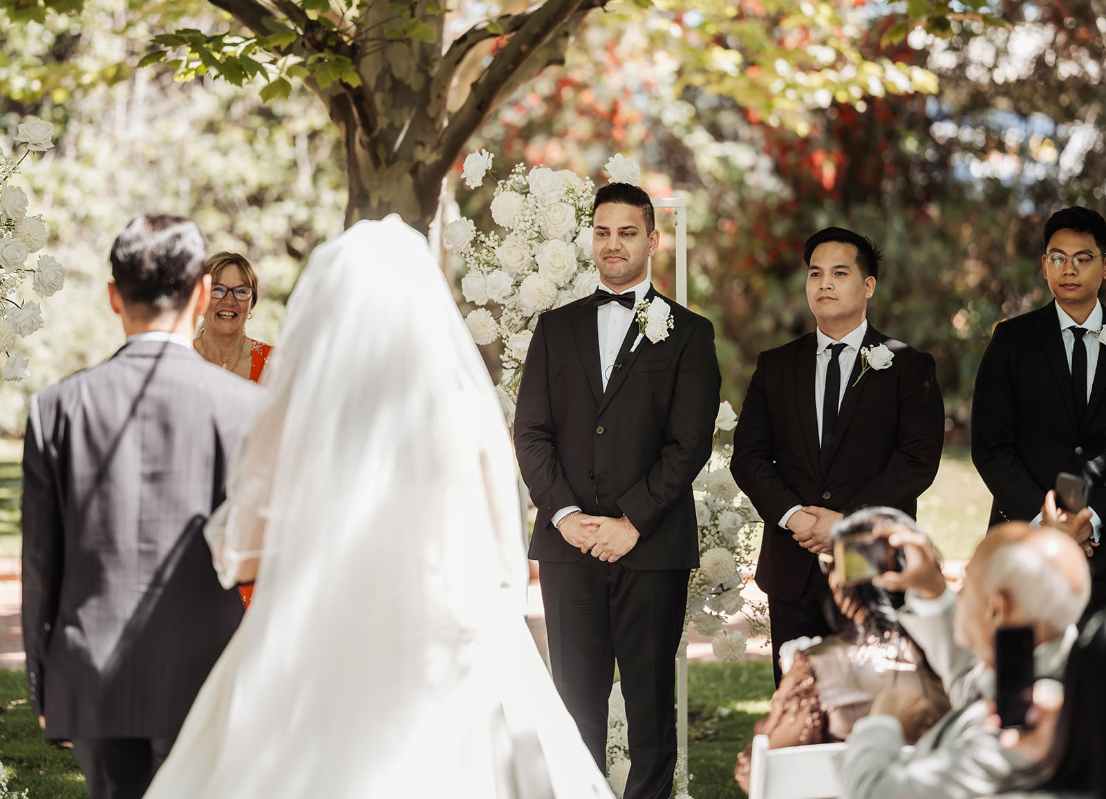 sunnybrae rose garden wedding - celina & anuj 43 Elegant outdoor wedding ceremony with scenic natural backdrop.