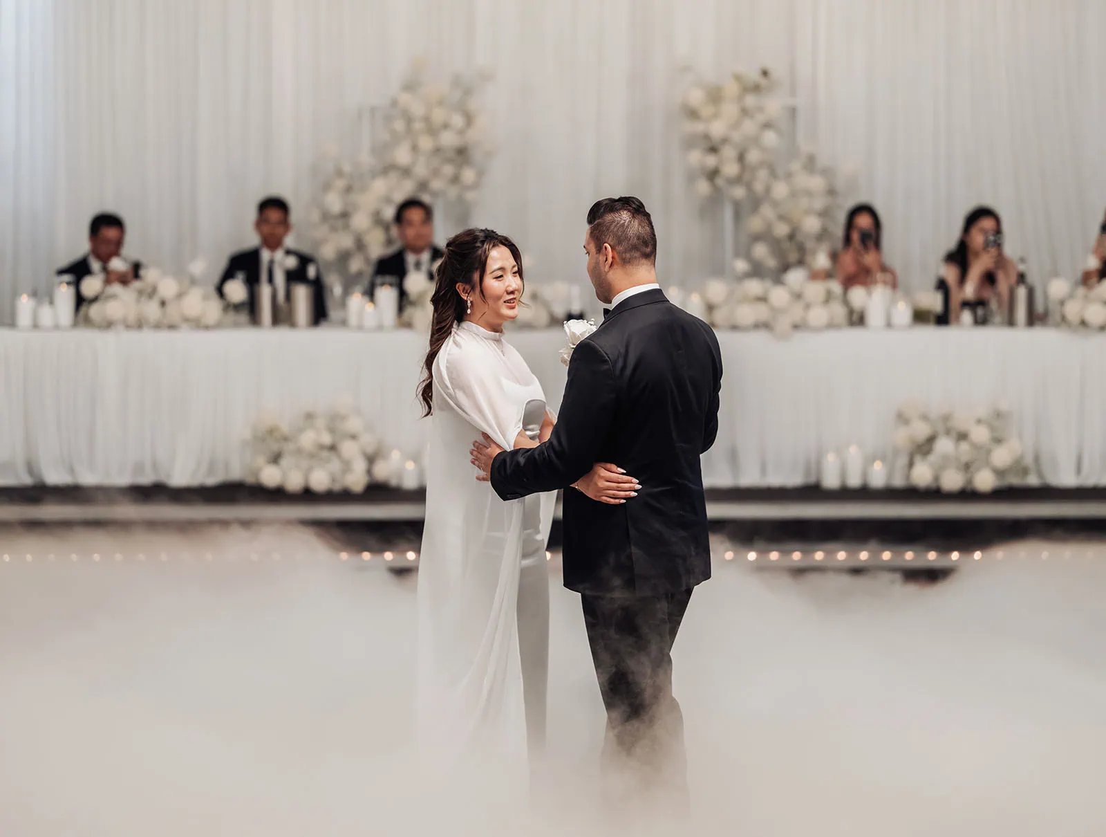 sunnybrae rose garden wedding - celina & anuj 84 Bride and groom share romantic first dance at elegant wedding reception.