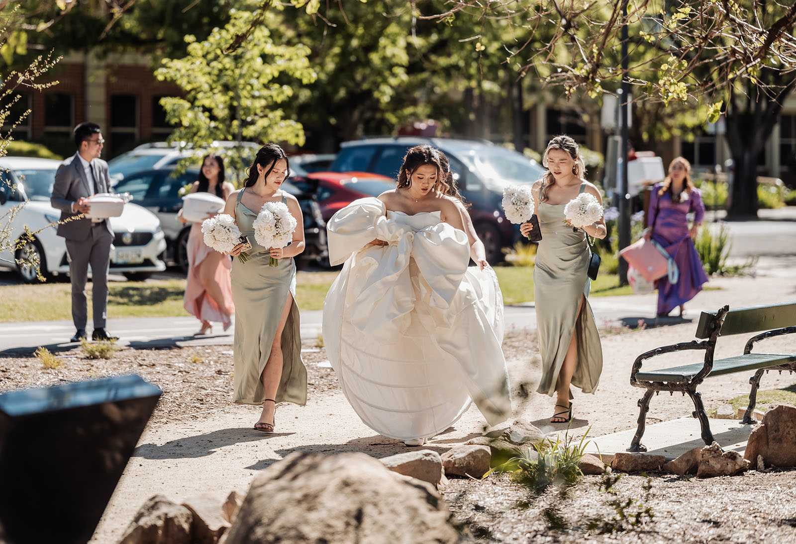 sunnybrae rose garden wedding - celina & anuj 16 Outdoor wedding ceremony with floral decorations and guests celebrating.