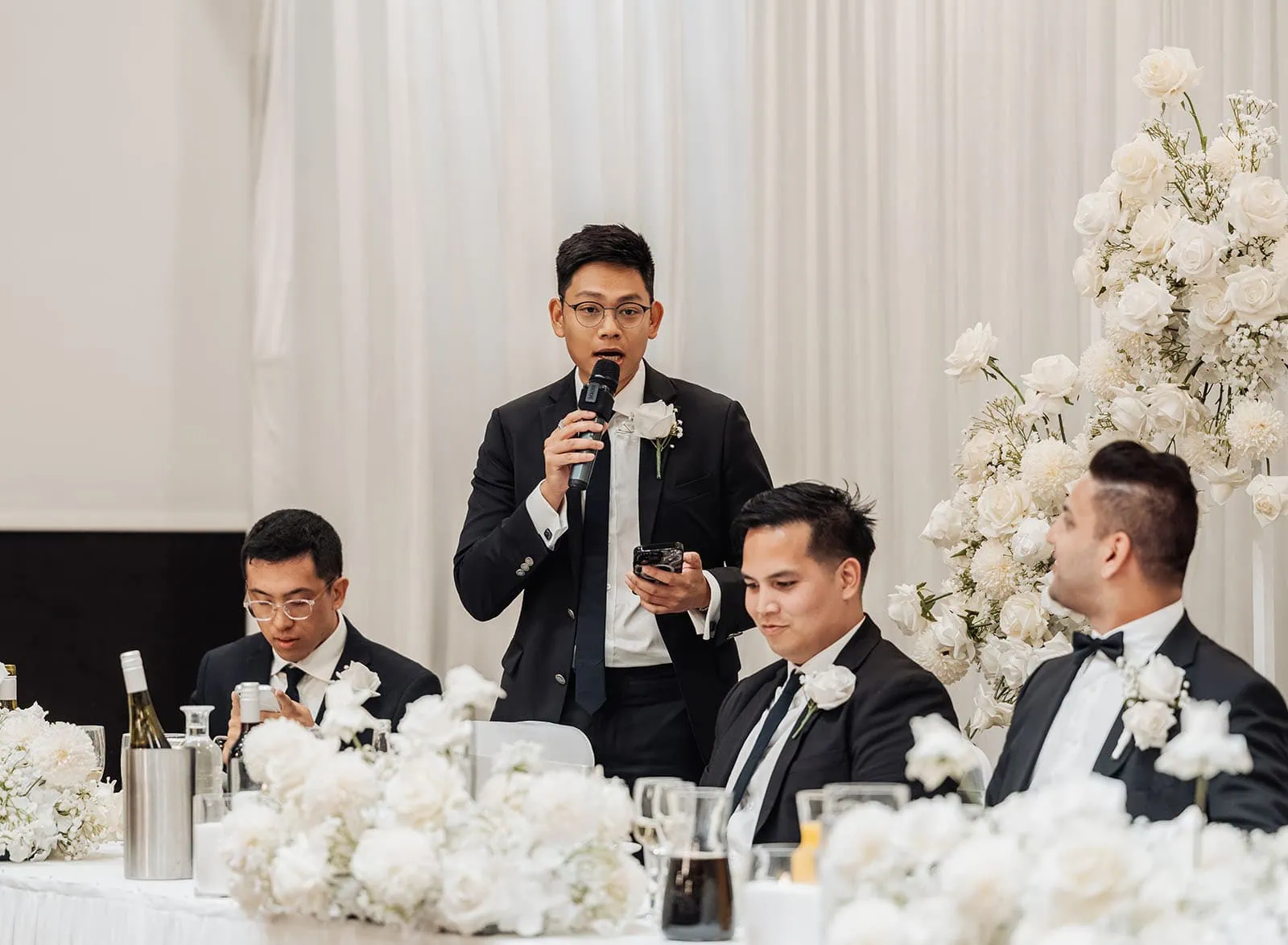 sunnybrae rose garden wedding - celina & anuj 78 Wedding reception speech captures heartfelt moments and joyous celebration.