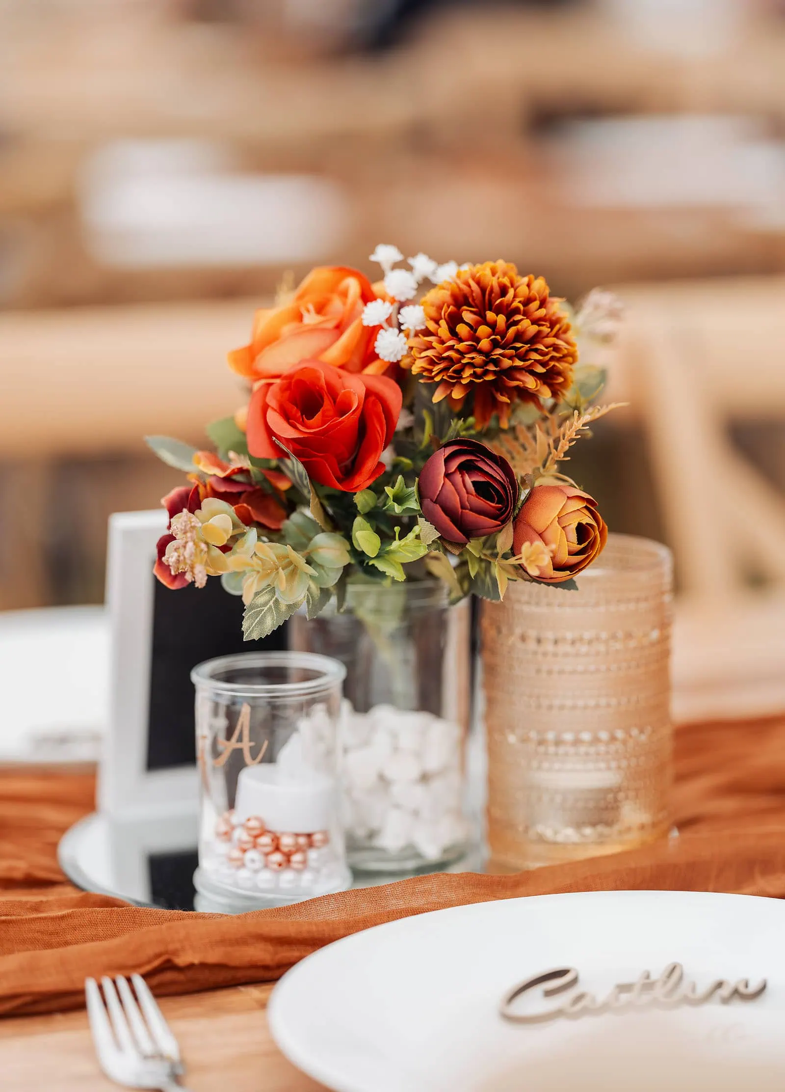 country victoria wedding in corrunnun – rachelle & anthony 361 Autumn-themed table setting with pumpkins, leaves, and warm tones for a festive gathering.