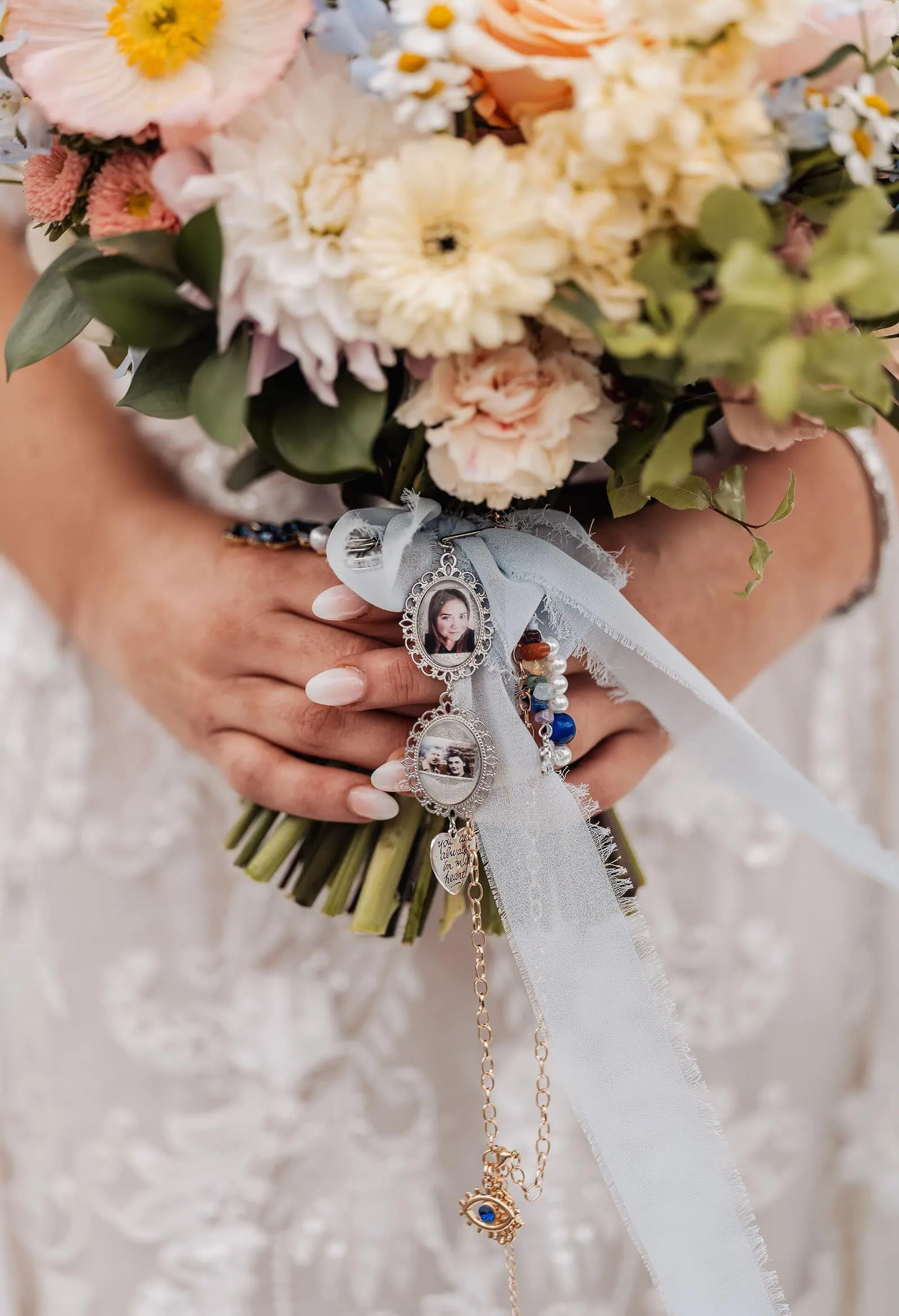 silvestris of clarendon wedding - sam & wayne 206 Elegant bridal bouquet charms add personalization and charm to wedding floral arrangements.