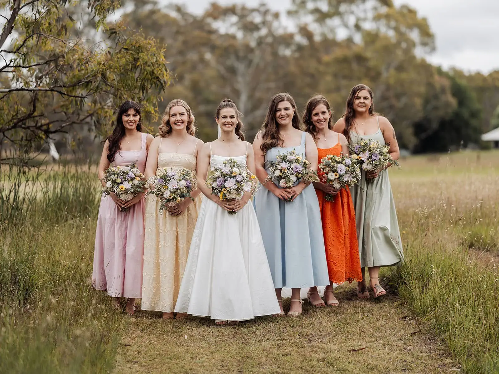 fleurieu cherries wedding - kimberley & richard 33 Elegant bridal party bouquets with roses and greenery, perfect for weddings and celebrations.