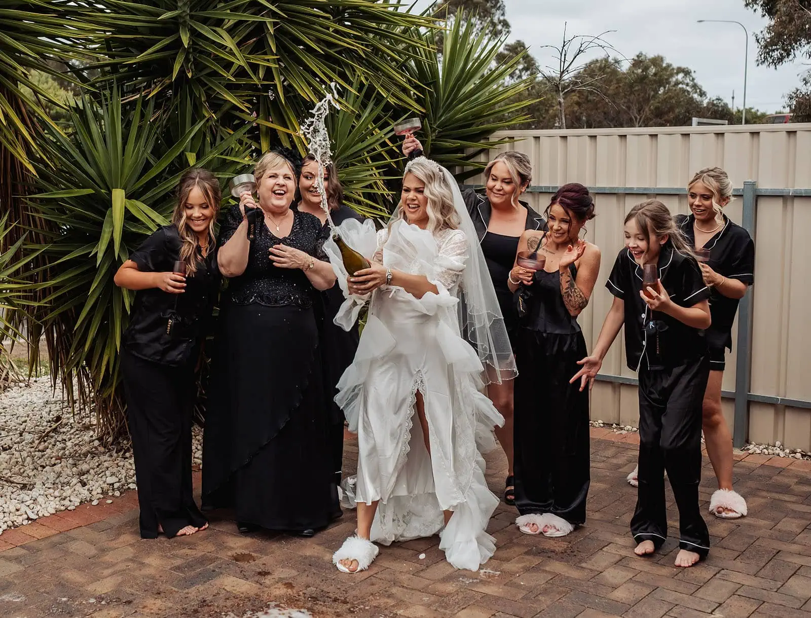 silvestris of clarendon wedding - sam & wayne 197 Bride Celebrating with Champagne Toast.