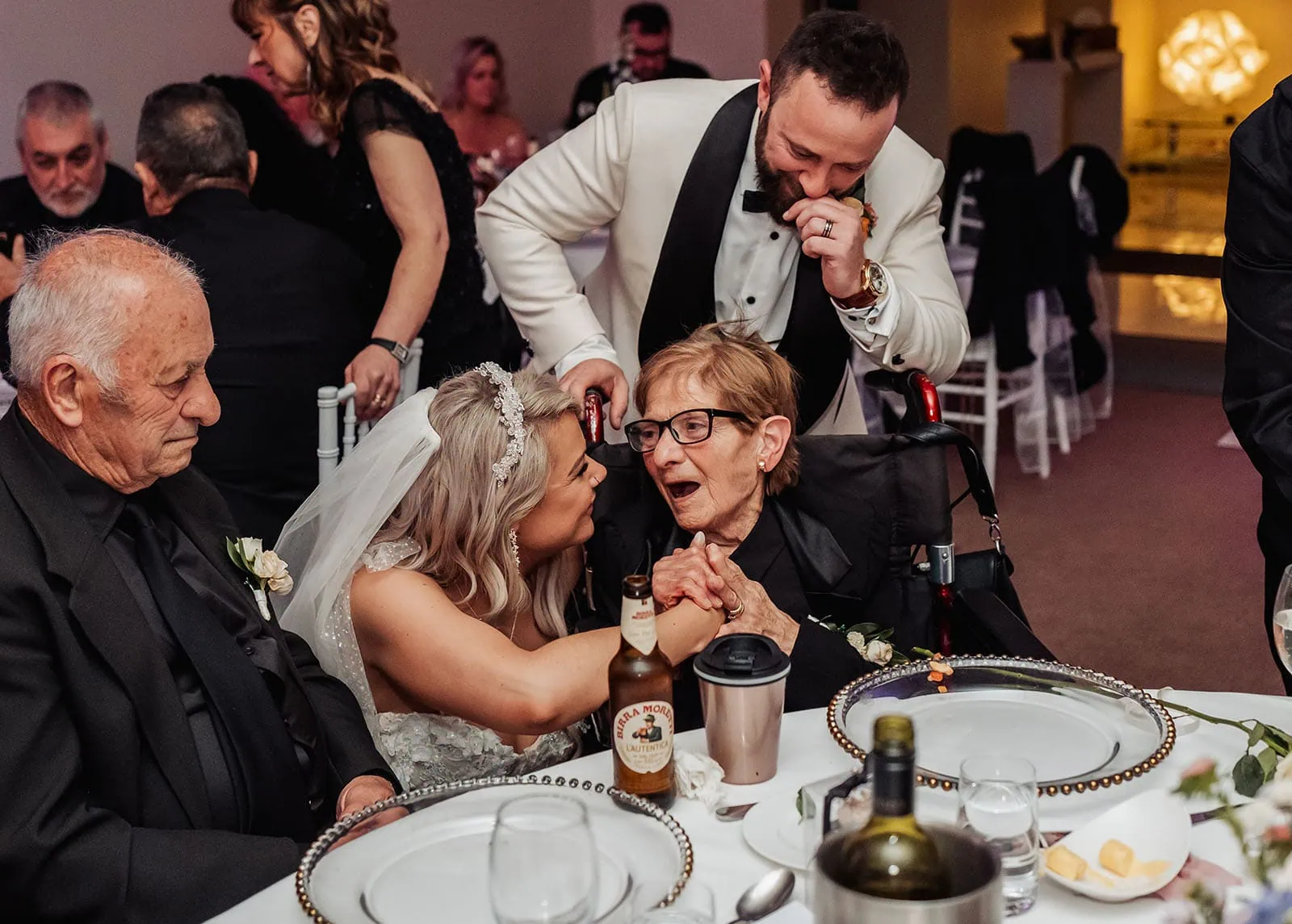 silvestris of clarendon wedding - sam & wayne 259 Bride shares heartfelt moment with grandmother at wedding.