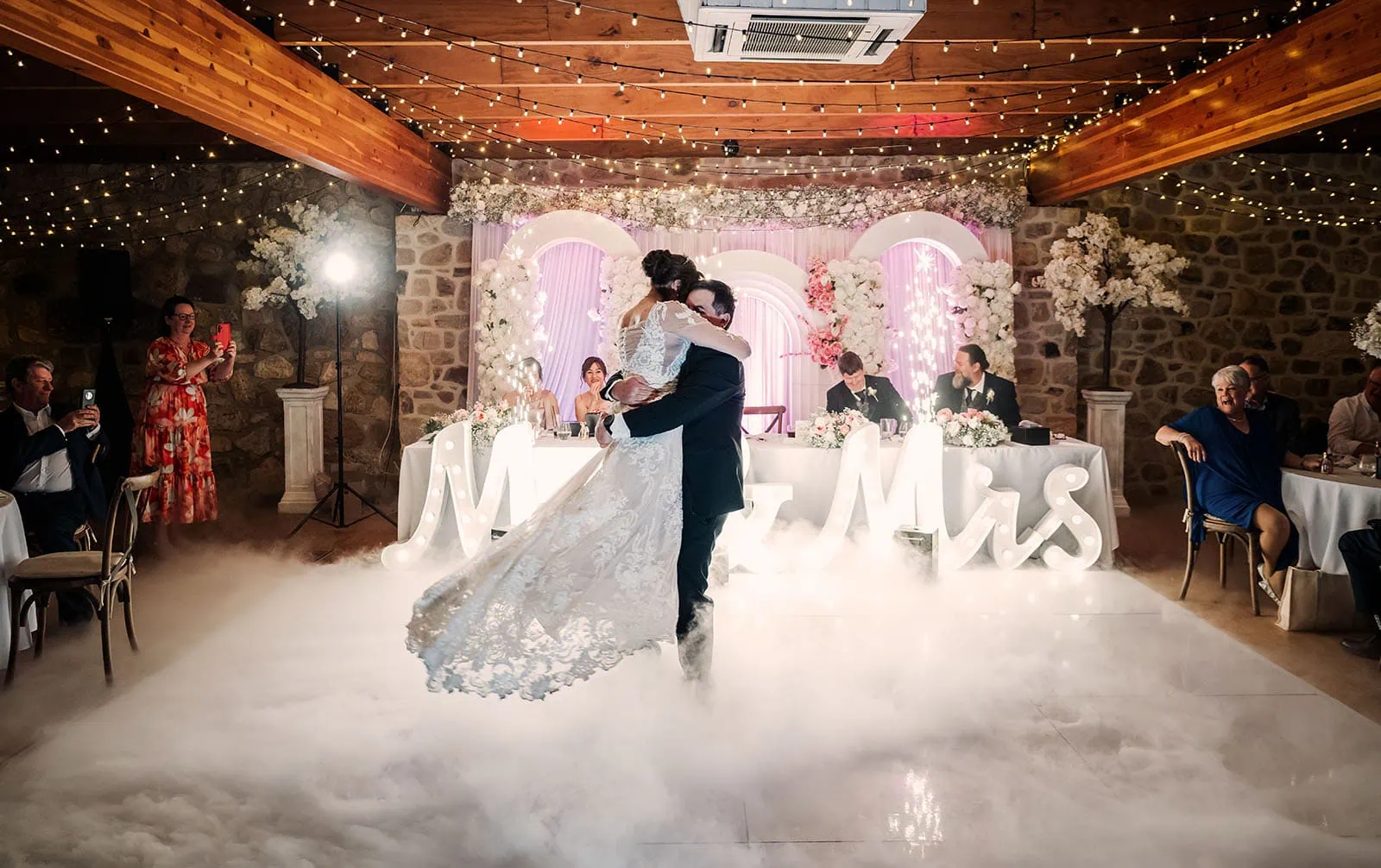 wedding at the manor in basket range - maryam & jason 170 Bride and groom share a romantic first dance at their wedding reception.