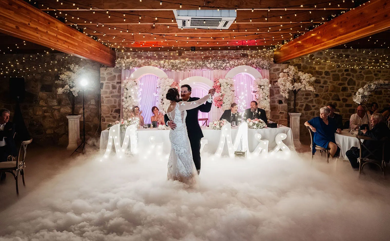 wedding at the manor in basket range - maryam & jason 171 Bride and groom share romantic first dance at wedding venue.