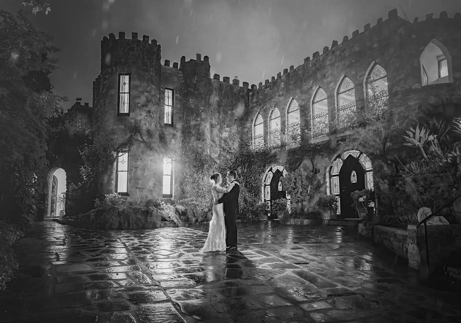 wedding at the manor in basket range - maryam & jason 163 Elegant couple dancing in a historic castles grand hall in black and white.