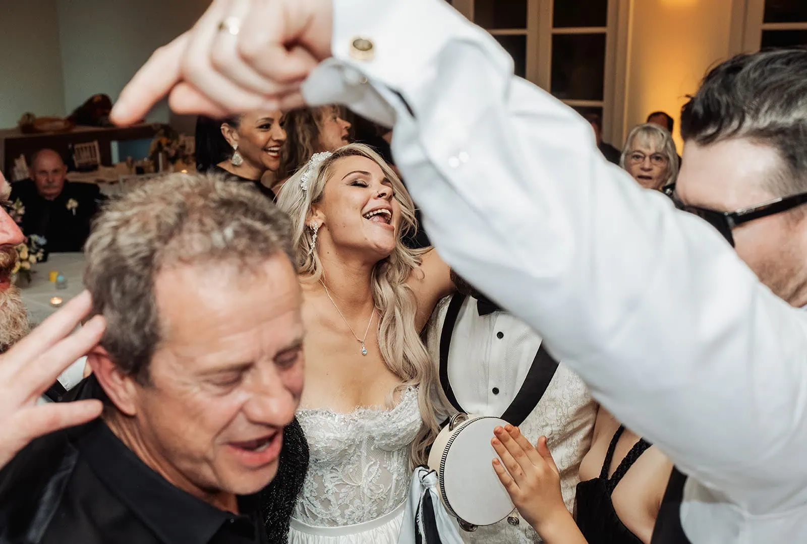 silvestris of clarendon wedding - sam & wayne 273 Joyful Celebration with Laughter and Smiles at a Festive Gathering.