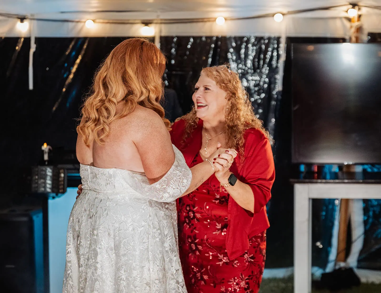 country victoria wedding in corrunnun – rachelle & anthony 371 Dancers joyously celebrate under vibrant lights and music.