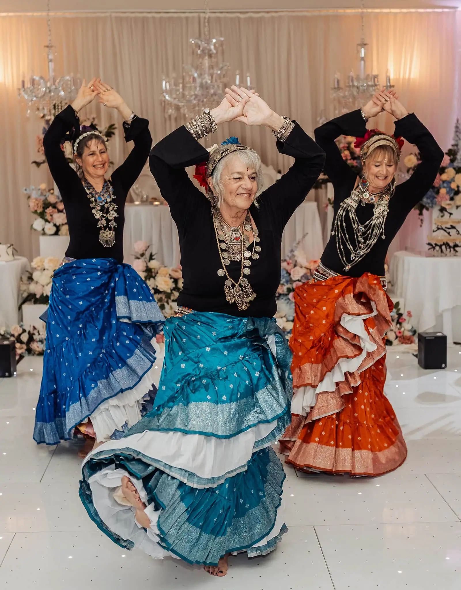 silvestris of clarendon wedding - sam & wayne 253 Vibrant dance performance showcasing traditional colorful attire.