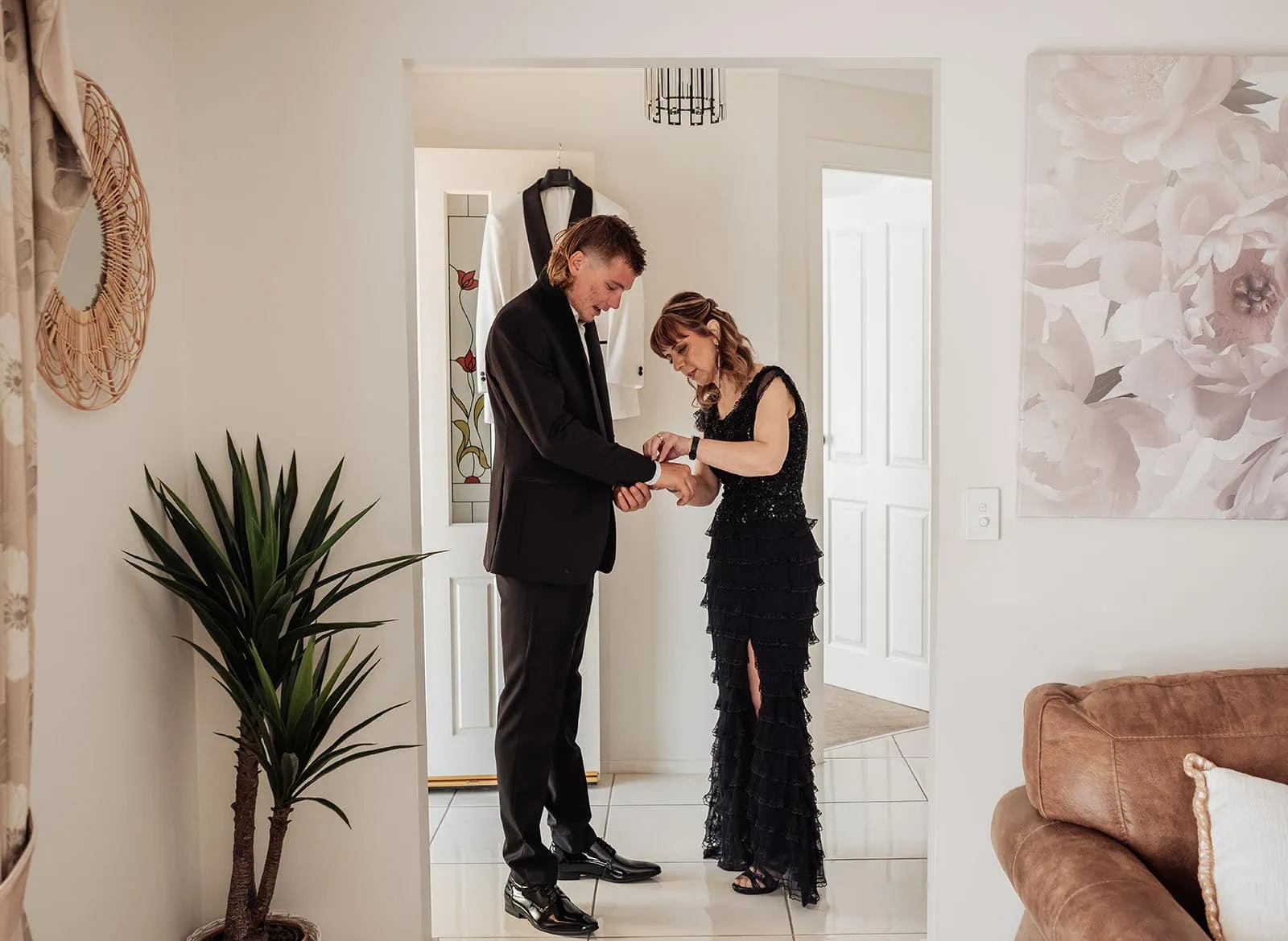 silvestris of clarendon wedding - sam & wayne 182 Helping with cuffs in Stylish Living Room