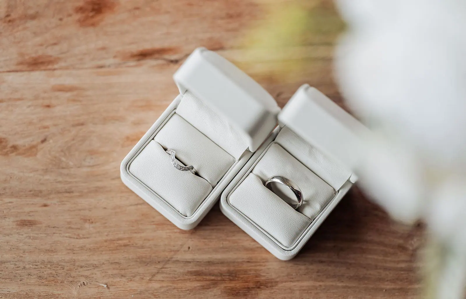 country victoria wedding in corrunnun – rachelle & anthony 293 Elegant gold and diamond wedding rings on display, perfect for modern bridal sets.