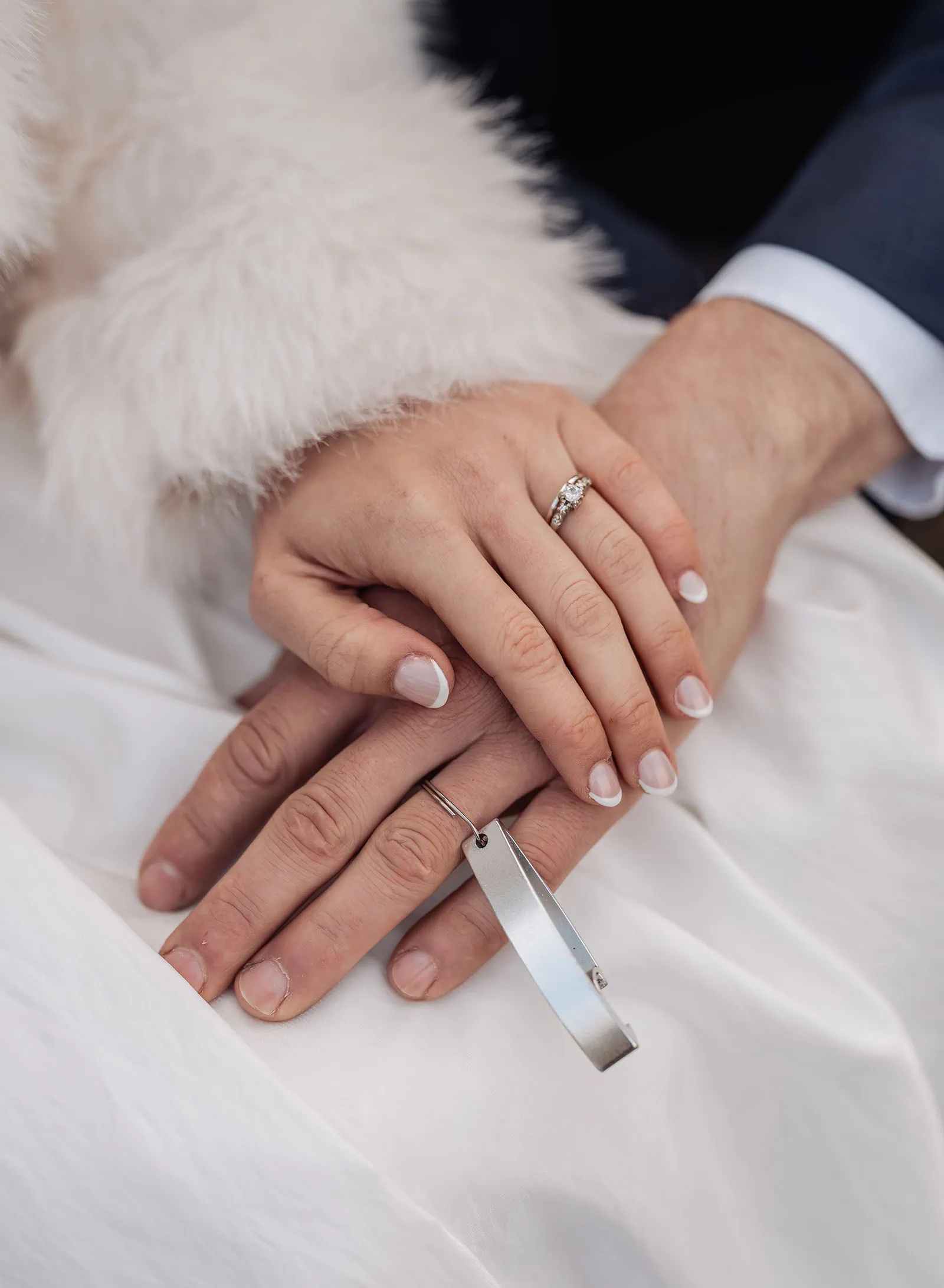 fleurieu cherries wedding - kimberley & richard 78 Close-up of hands with engagement ring, love, romance, commitment.
