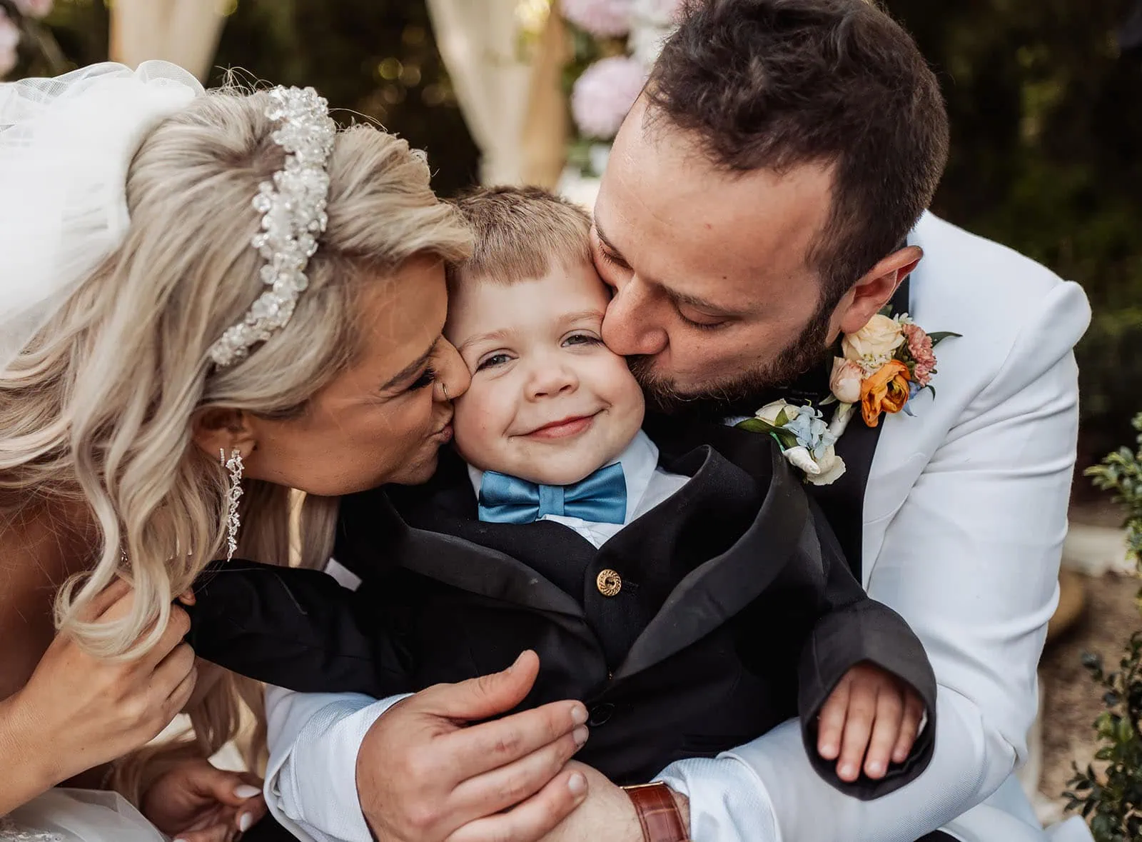 silvestris of clarendon wedding - sam & wayne 225 Happy family sharing a heartfelt moment together at home.