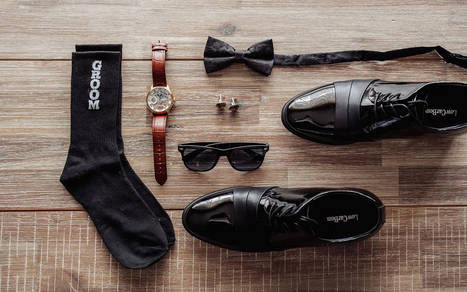silvestris of clarendon wedding - sam & wayne 181 Elegant groom accessories including cufflinks, tie, and watch for wedding day style.