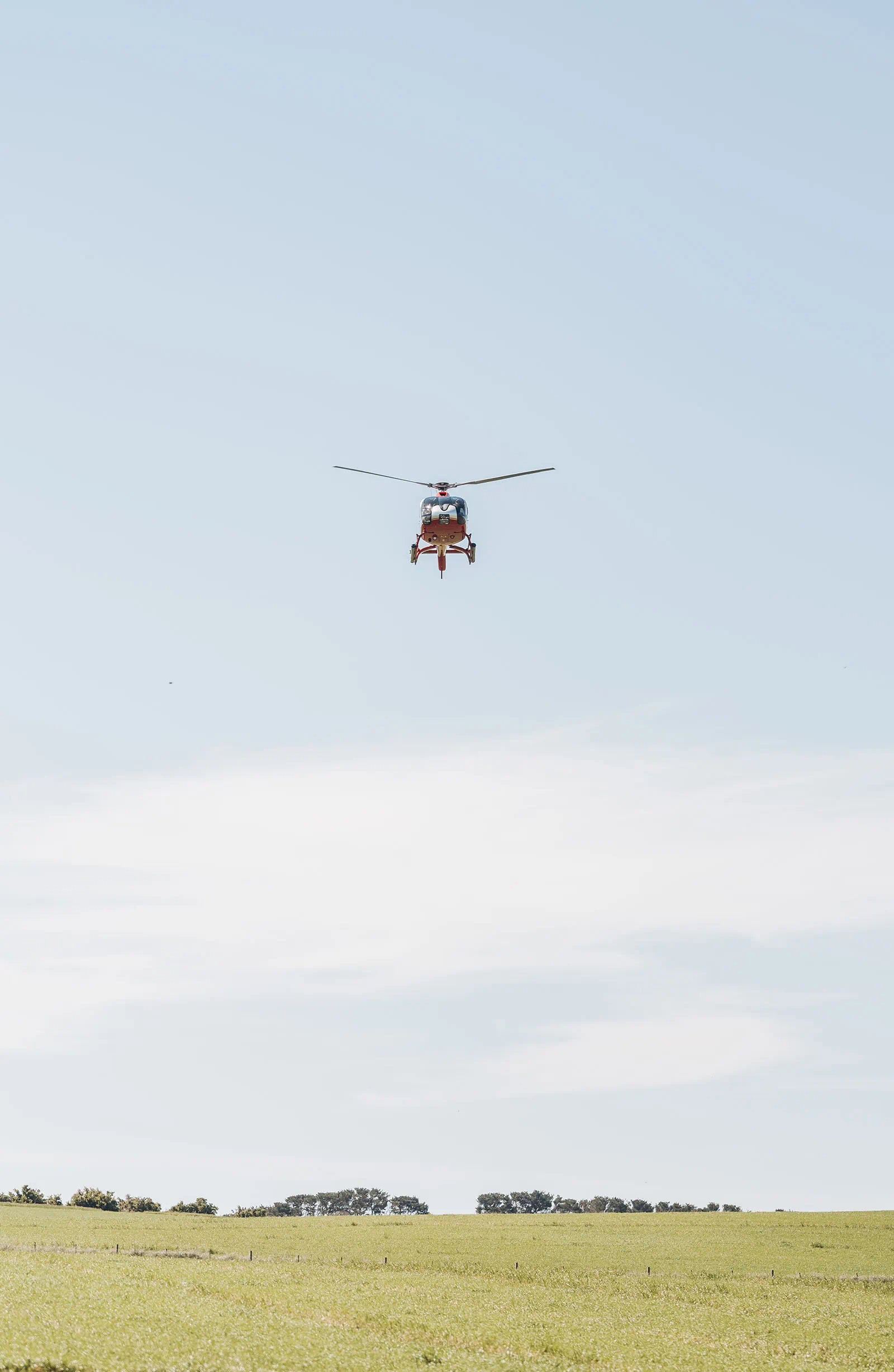 country victoria wedding in corrunnun – rachelle & anthony 313 Helicopter soaring over vast, open landscape.