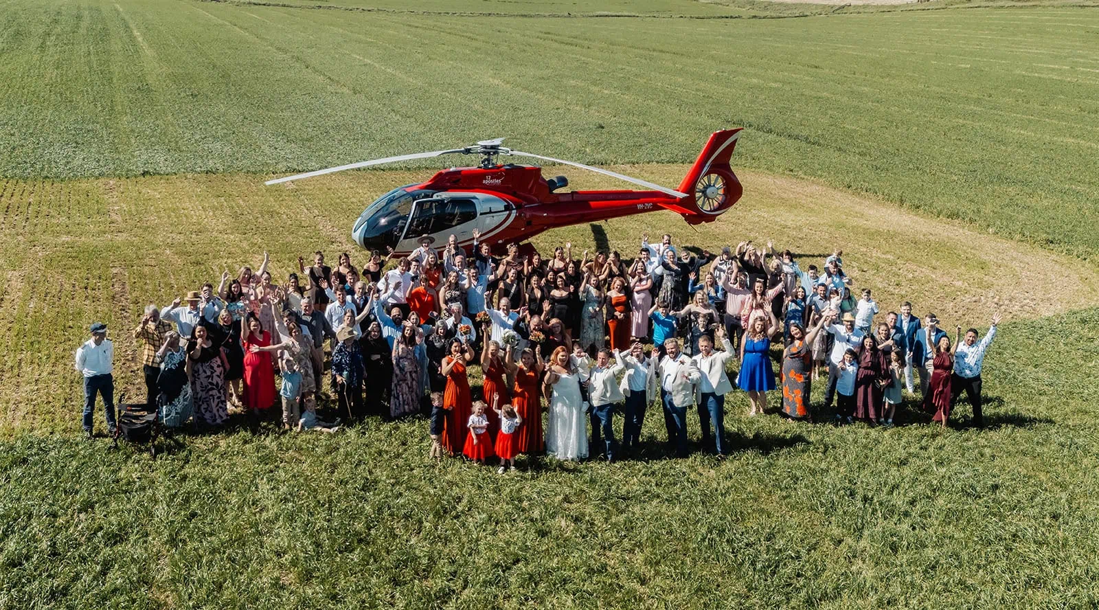 country victoria wedding in corrunnun – rachelle & anthony 327 Outdoor wedding celebration with helicopter arrival, scenic views, and happy couple.