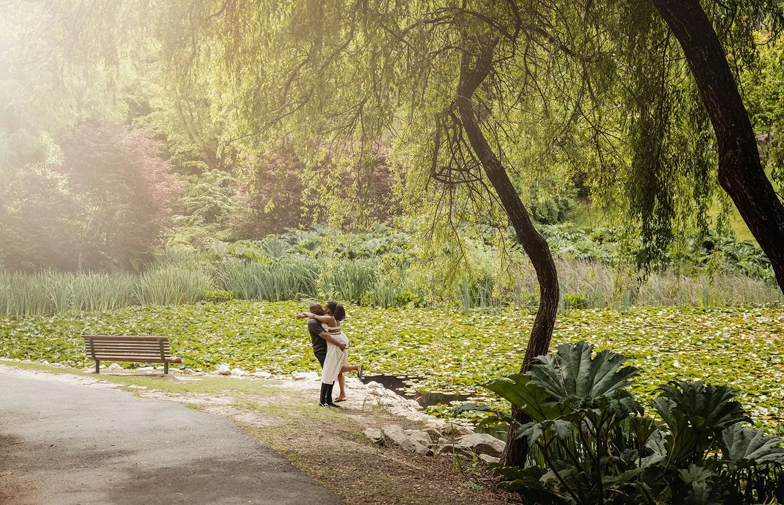 mt lofty botanic gardens couples shoot – ruth & emanuel 15 Couple enjoys a romantic walk in a serene park setting.