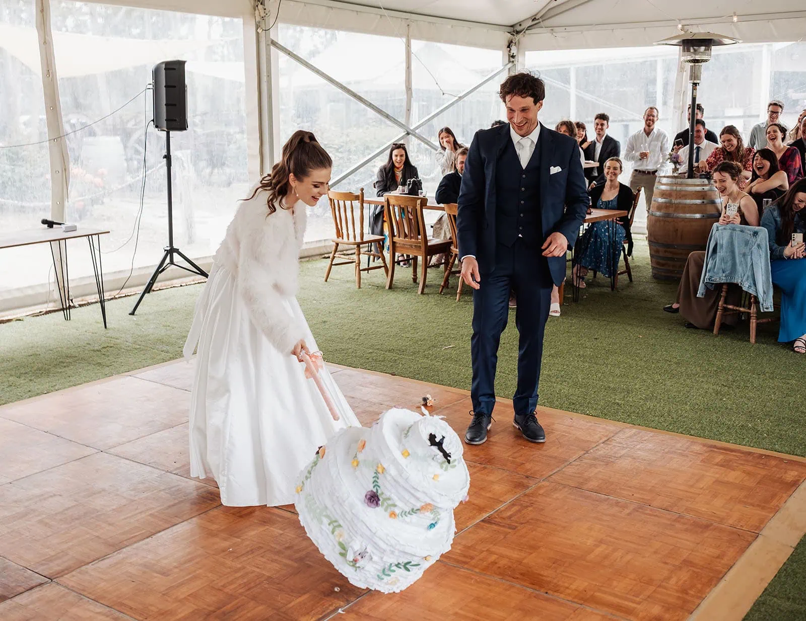 fleurieu cherries wedding - kimberley & richard 55 Colorful wedding piñata with flowers, celebrating love and joy.