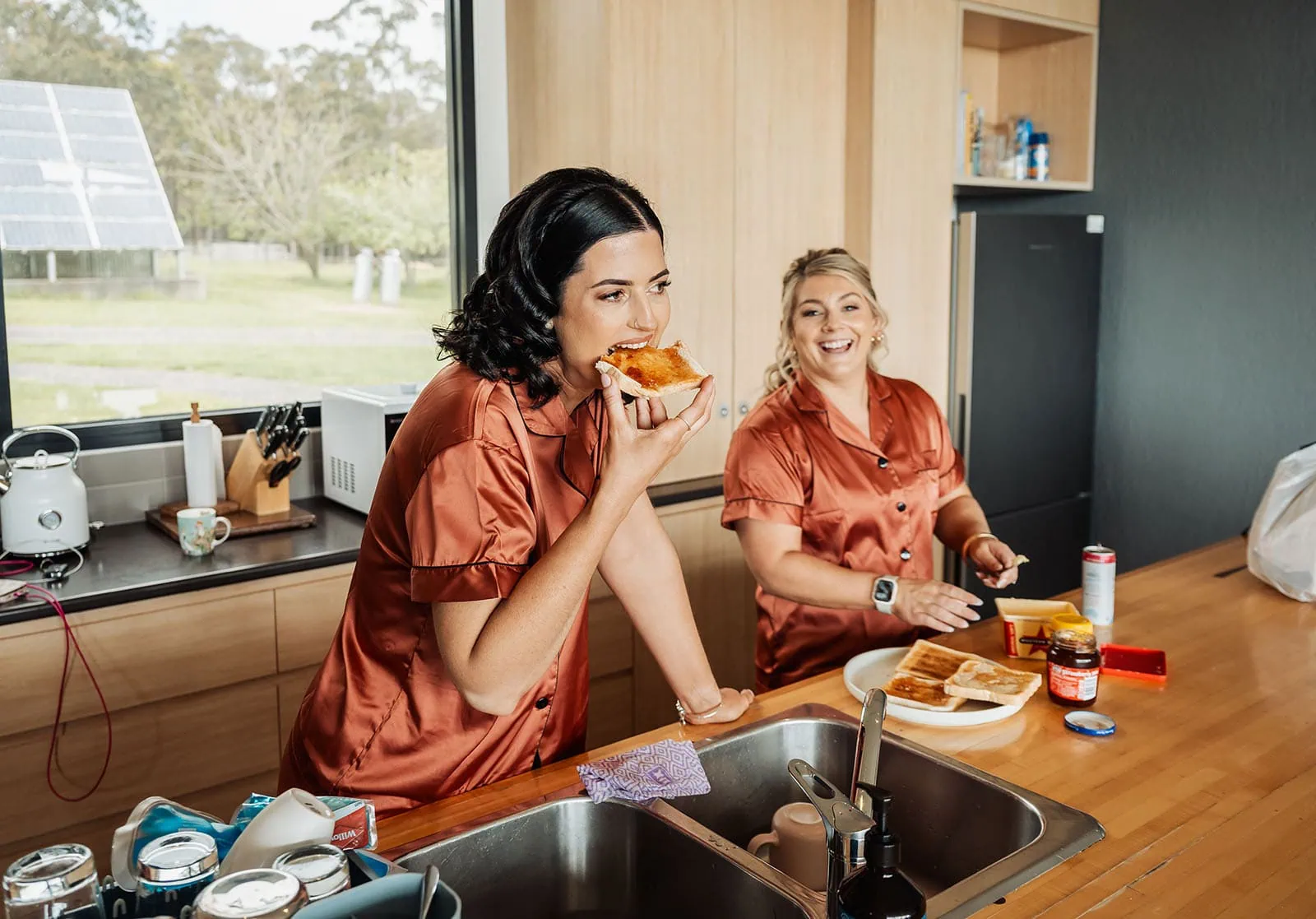 country victoria wedding in corrunnun – rachelle & anthony 298 Contemporary kitchen with sleek countertops, breakfast bar, and modern appliances.