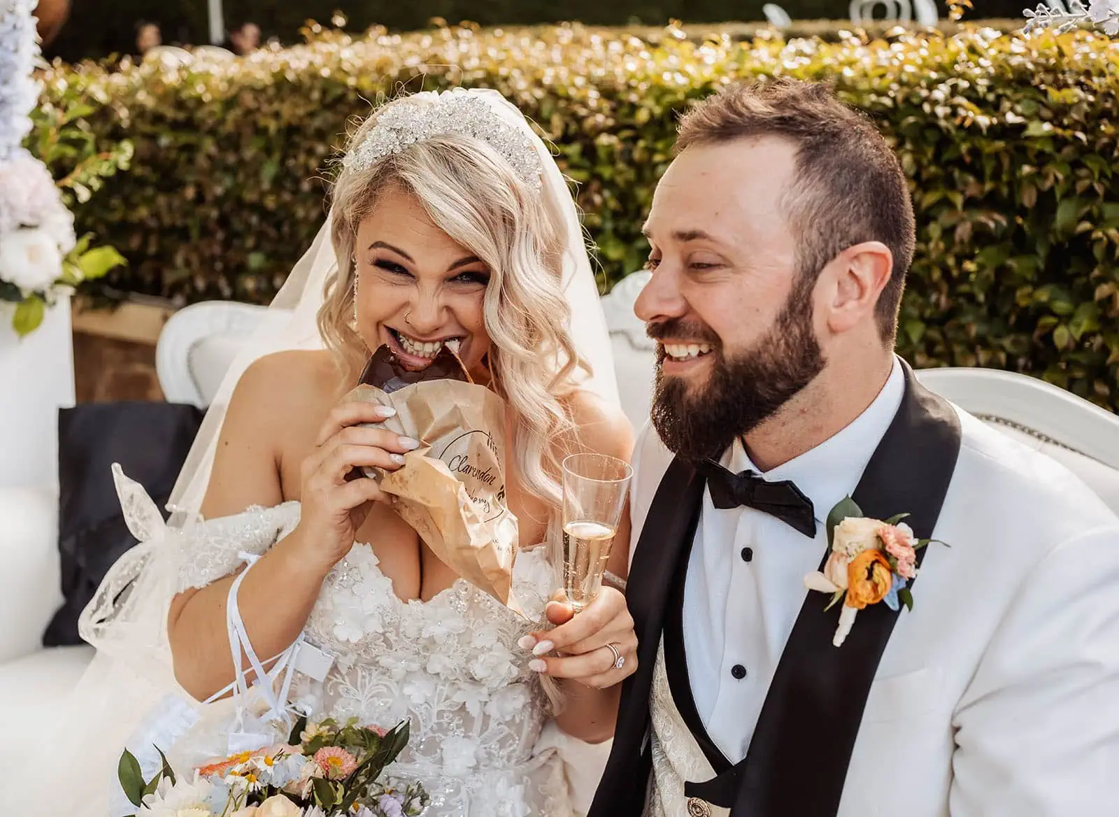 silvestris of clarendon wedding - sam & wayne 231 Happy newlyweds embracing, celebrating love and joy on their special day.
