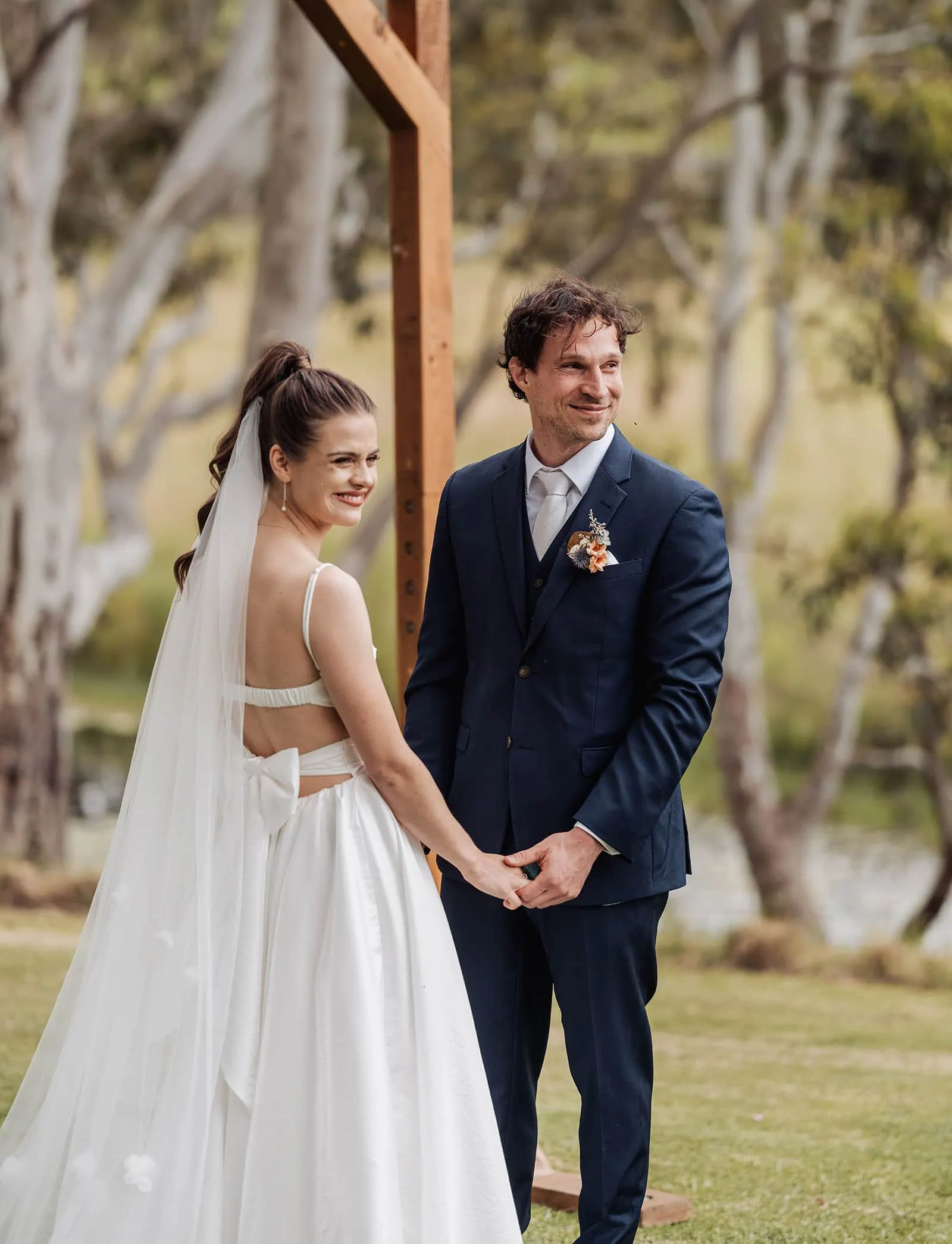 fleurieu cherries wedding - kimberley & richard 9 Elegant outdoor wedding with floral arch and seated guests.