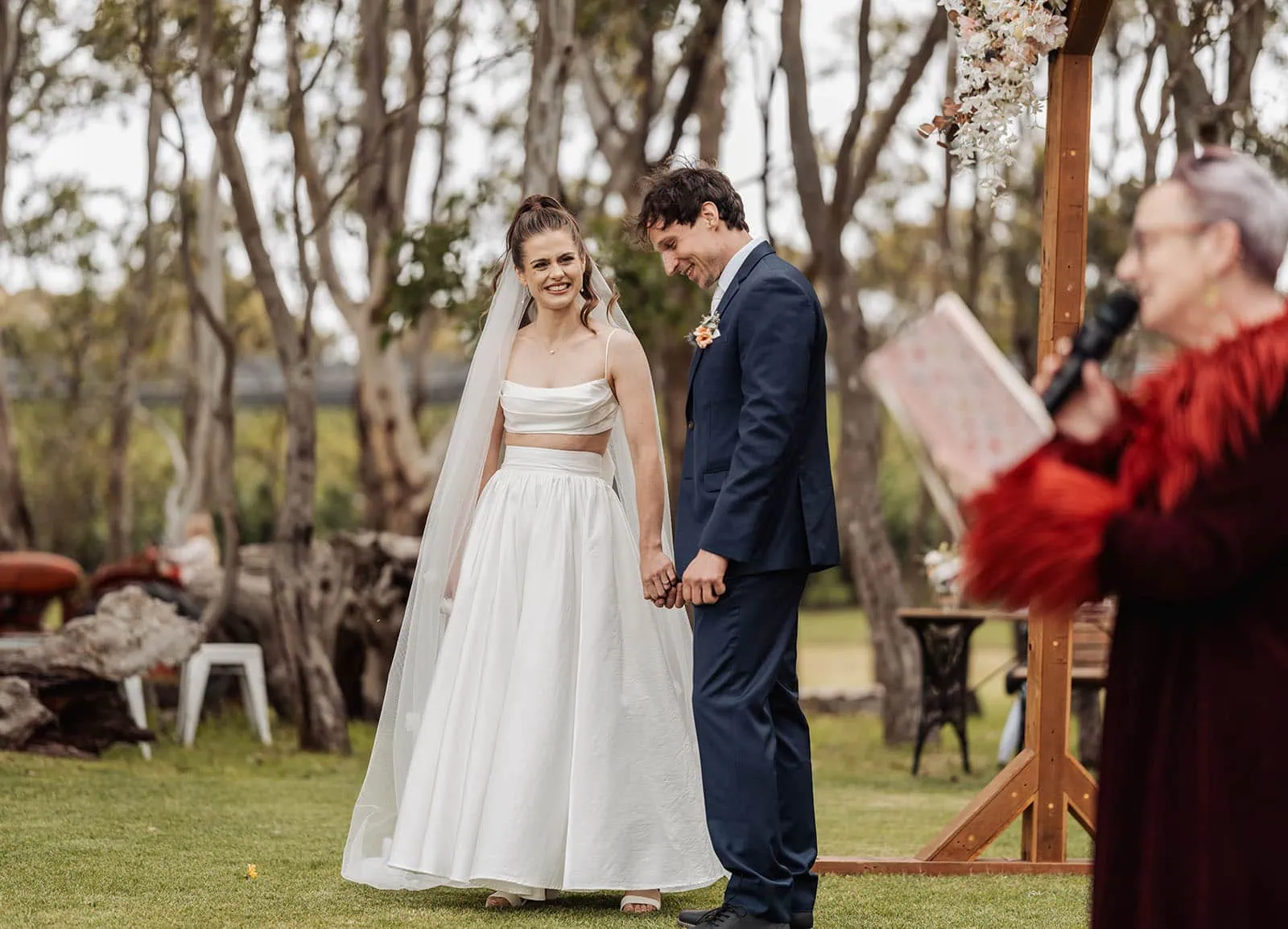 fleurieu cherries wedding - kimberley & richard 16 Outdoor wedding setting with beautiful floral arrangements and elegant seating.