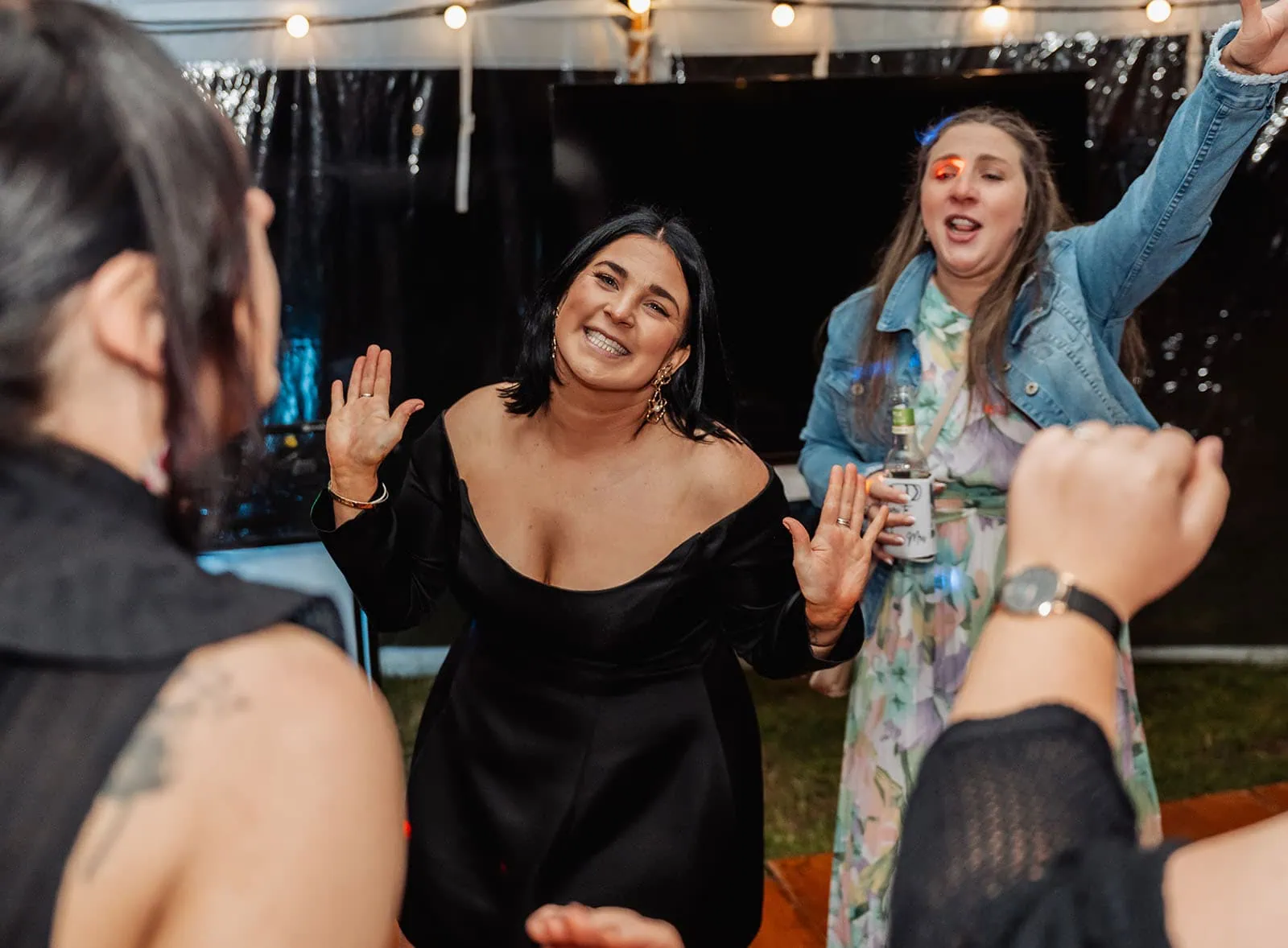 country victoria wedding in corrunnun – rachelle & anthony 372 Festive party celebration with colorful decorations, joyful guests, and vibrant atmosphere.