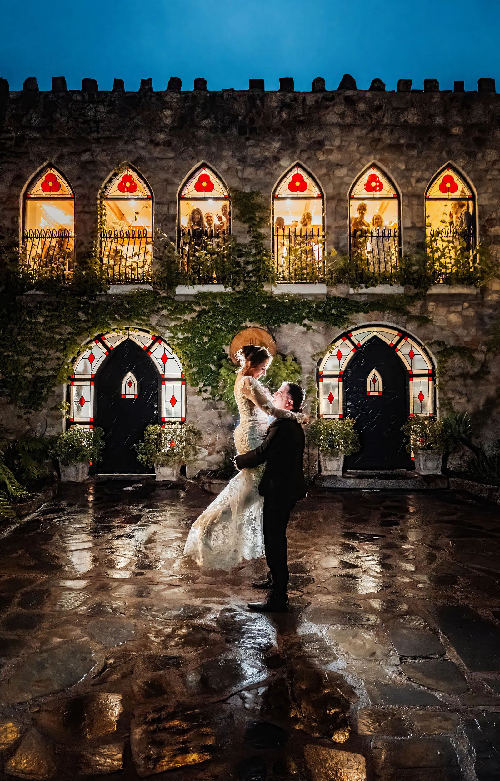wedding at the manor in basket range - maryam & jason 164 Majestic castle at sunset with pink skies and lush gardens.