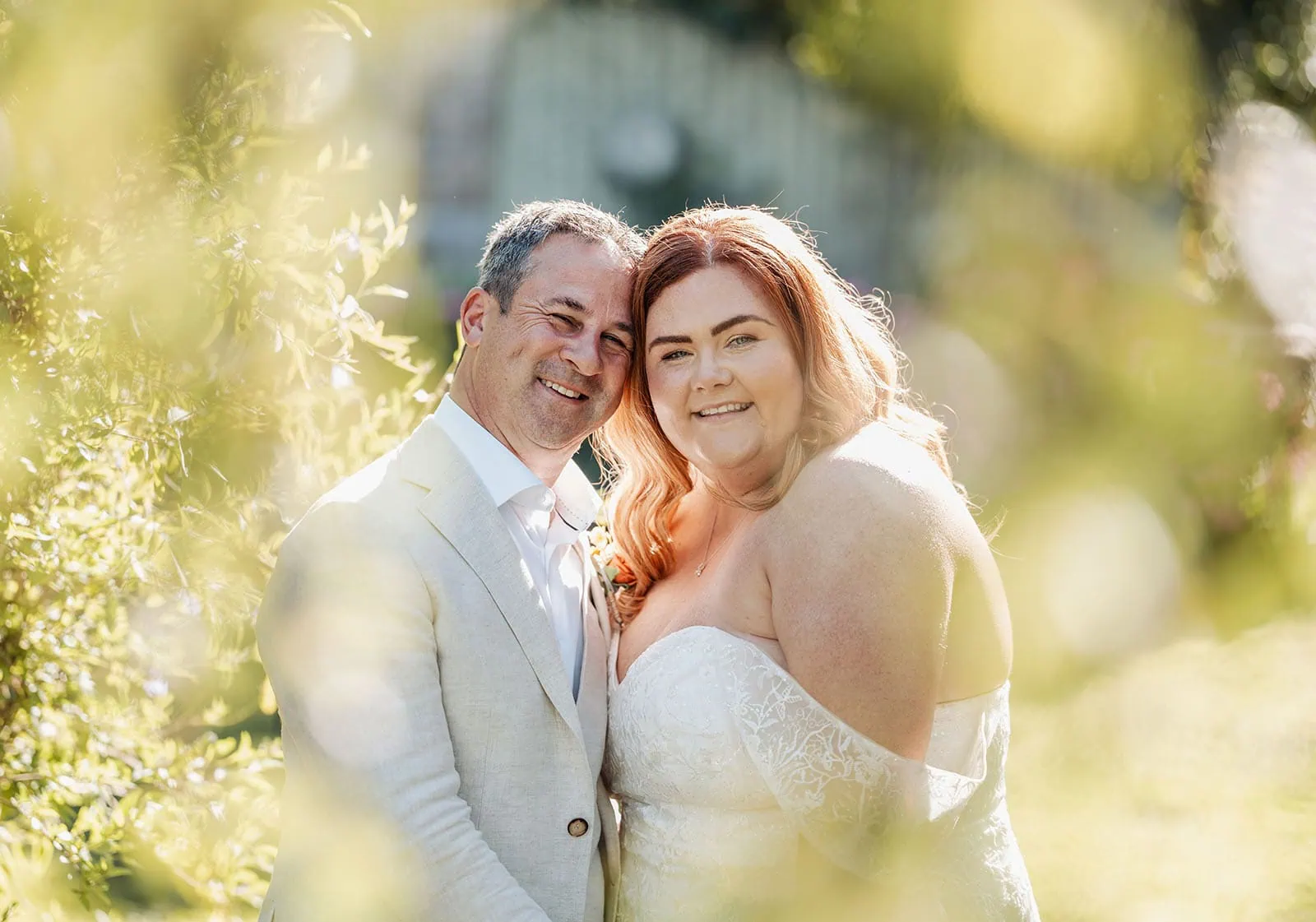 country victoria wedding in corrunnun – rachelle & anthony 339 Happy couple embracing at sunset on a beach.