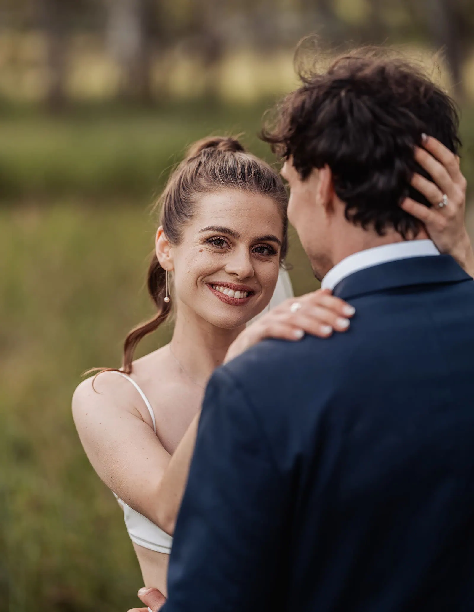 fleurieu cherries wedding - kimberley & richard 75 Couple embracing in a lush, romantic garden setting.