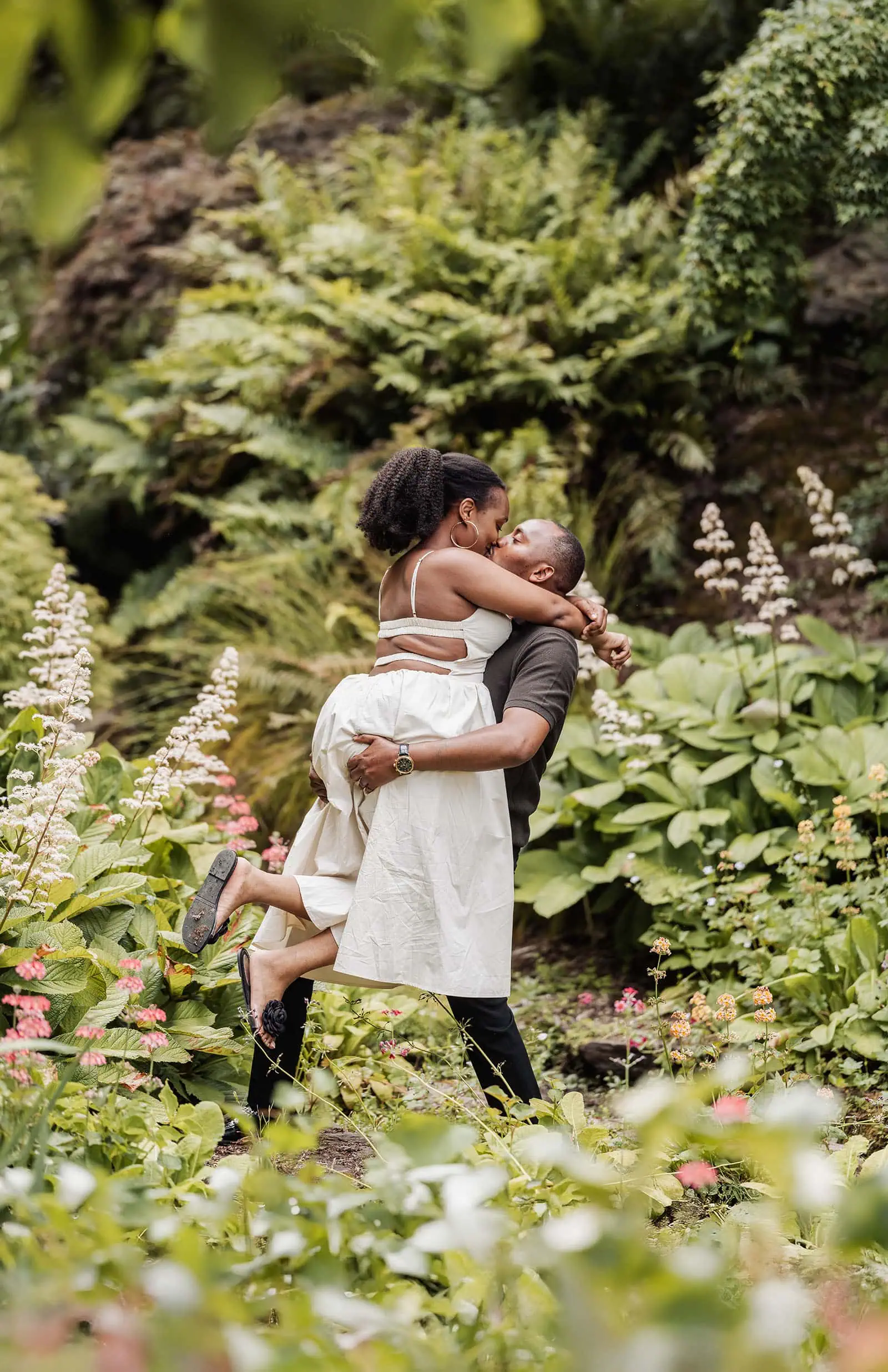 mt lofty botanic gardens couples shoot – ruth & emanuel 20 Romantic couple in lush garden setting during sunset, enjoying peaceful nature moment.