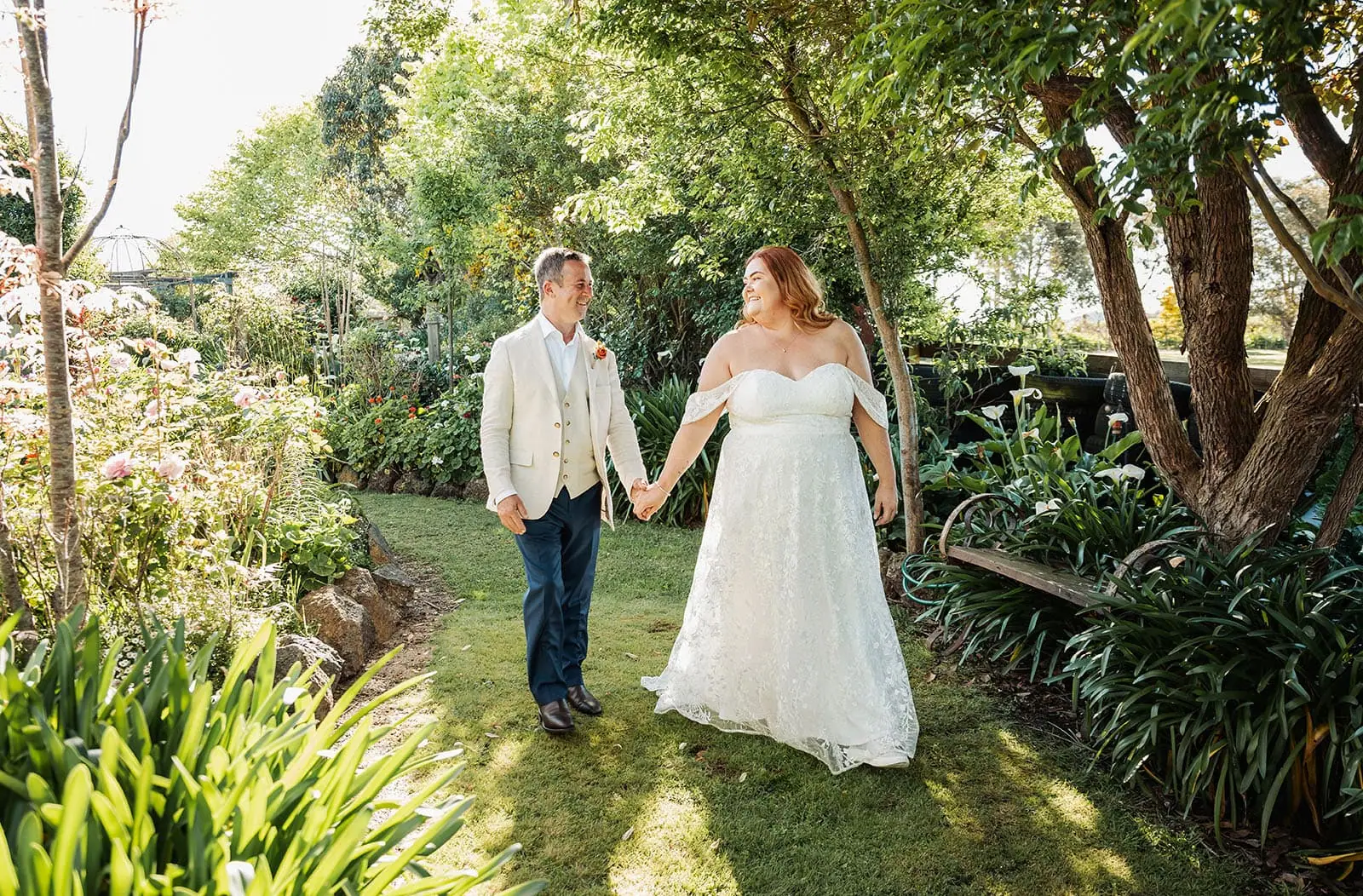 country victoria wedding in corrunnun – rachelle & anthony 341 Garden wedding with romantic floral arch and elegant couple.