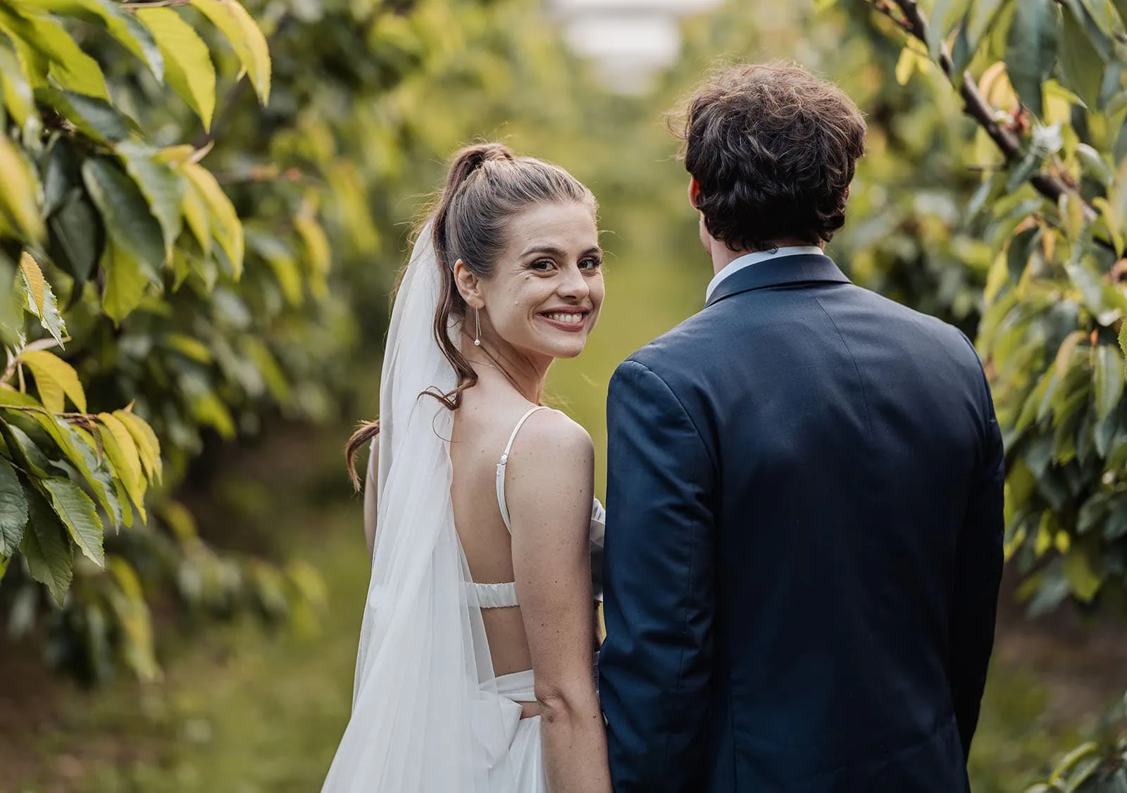 fleurieu cherries wedding - kimberley & richard 79 Romantic orchard wedding with blooming trees and elegant outdoor decor.