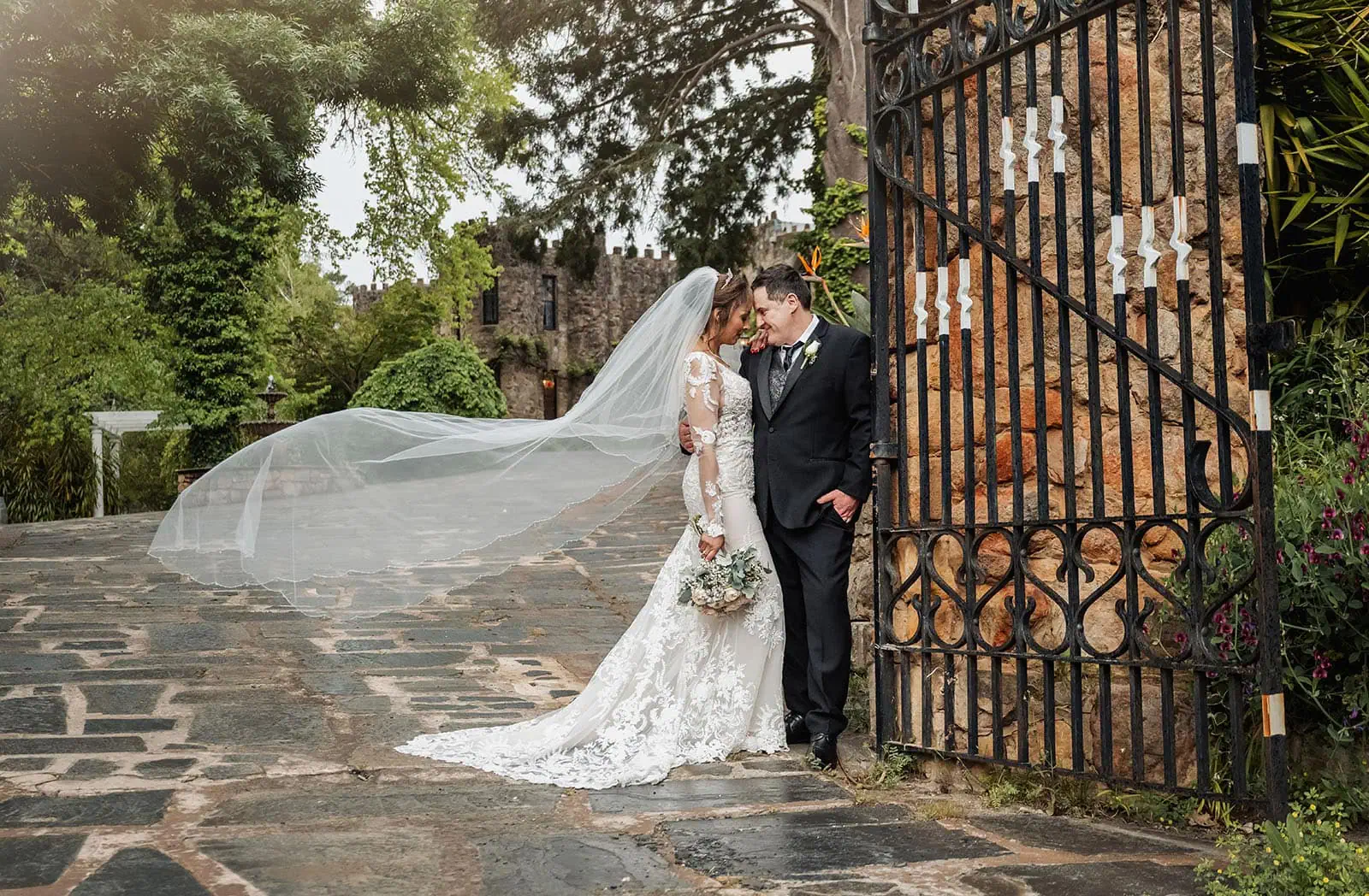 wedding at the manor in basket range - maryam & jason 159 Outdoor wedding with elegant decor and natural scenery for a romantic ceremony.