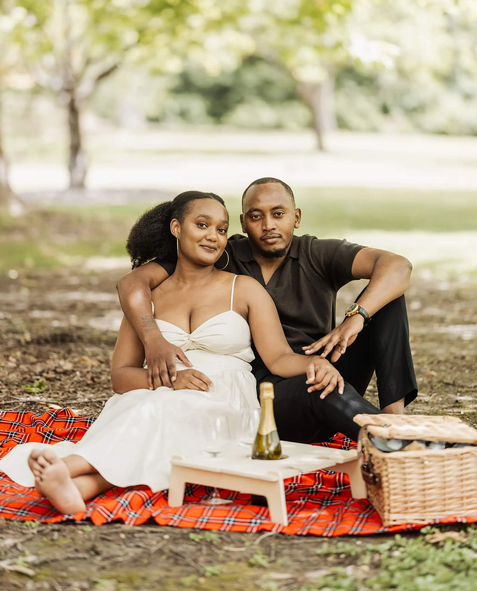 mt lofty botanic gardens couples shoot – ruth & emanuel 2 Romantic picnic with a couple at sunset, enjoying wine and a scenic view.
