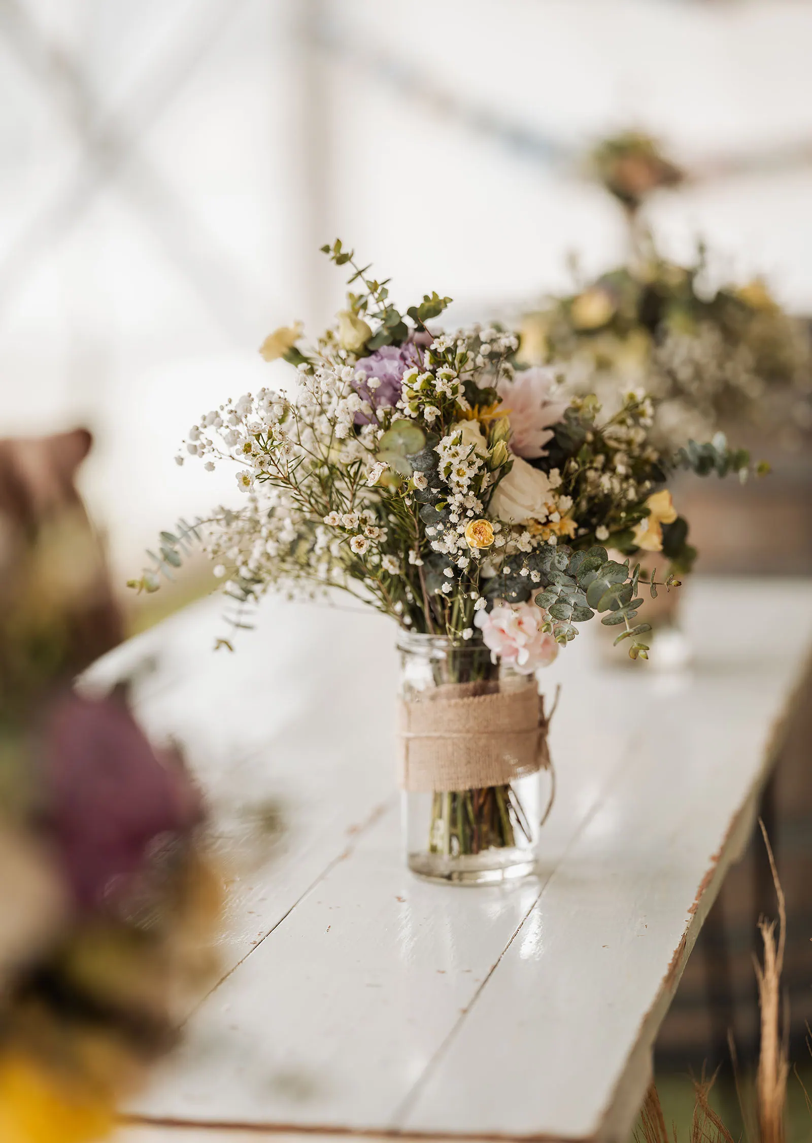 fleurieu cherries wedding - kimberley & richard 51 Rustic flower bouquet with wildflowers and greenery in natural, earthy tones.