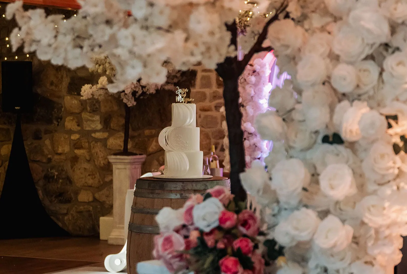 wedding at the manor in basket range - maryam & jason 149 Rustic wedding cake with floral decorations and burlap accents.