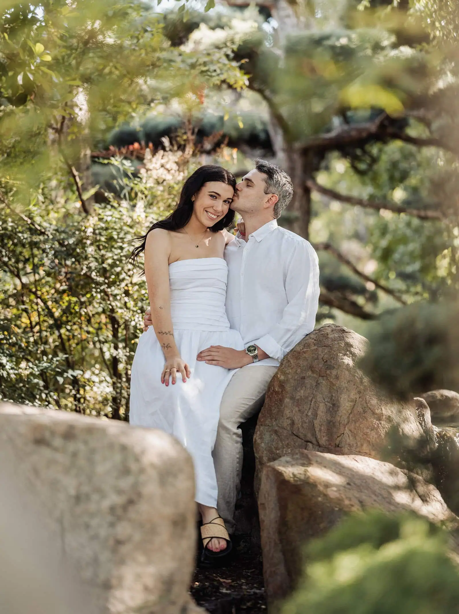 himeji gardens couples shoot - tom & tess 99 Couple enjoying peace in a tranquil garden setting.