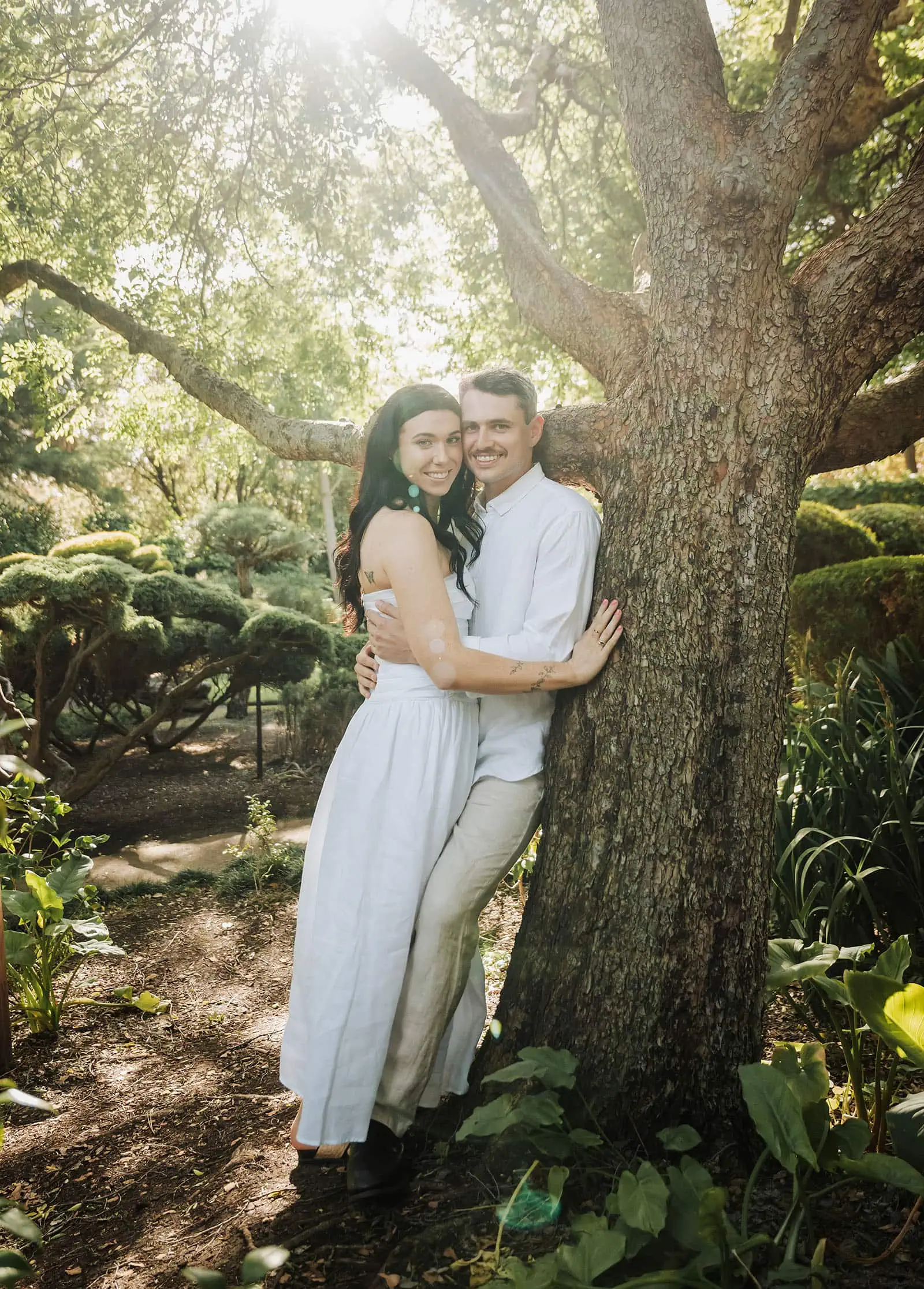 himeji gardens couples shoot - tom & tess 102 Peaceful couple enjoys tranquil garden scenery.