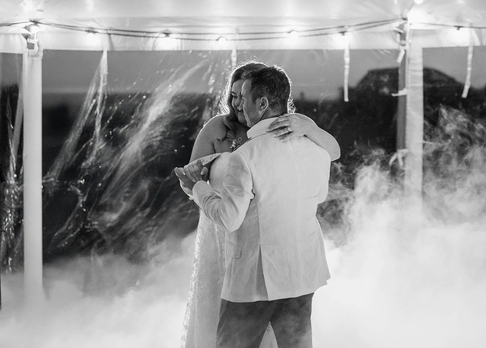 country victoria wedding in corrunnun – rachelle & anthony 369 Romantic couple dancing closely under soft lights, sharing an intimate moment.