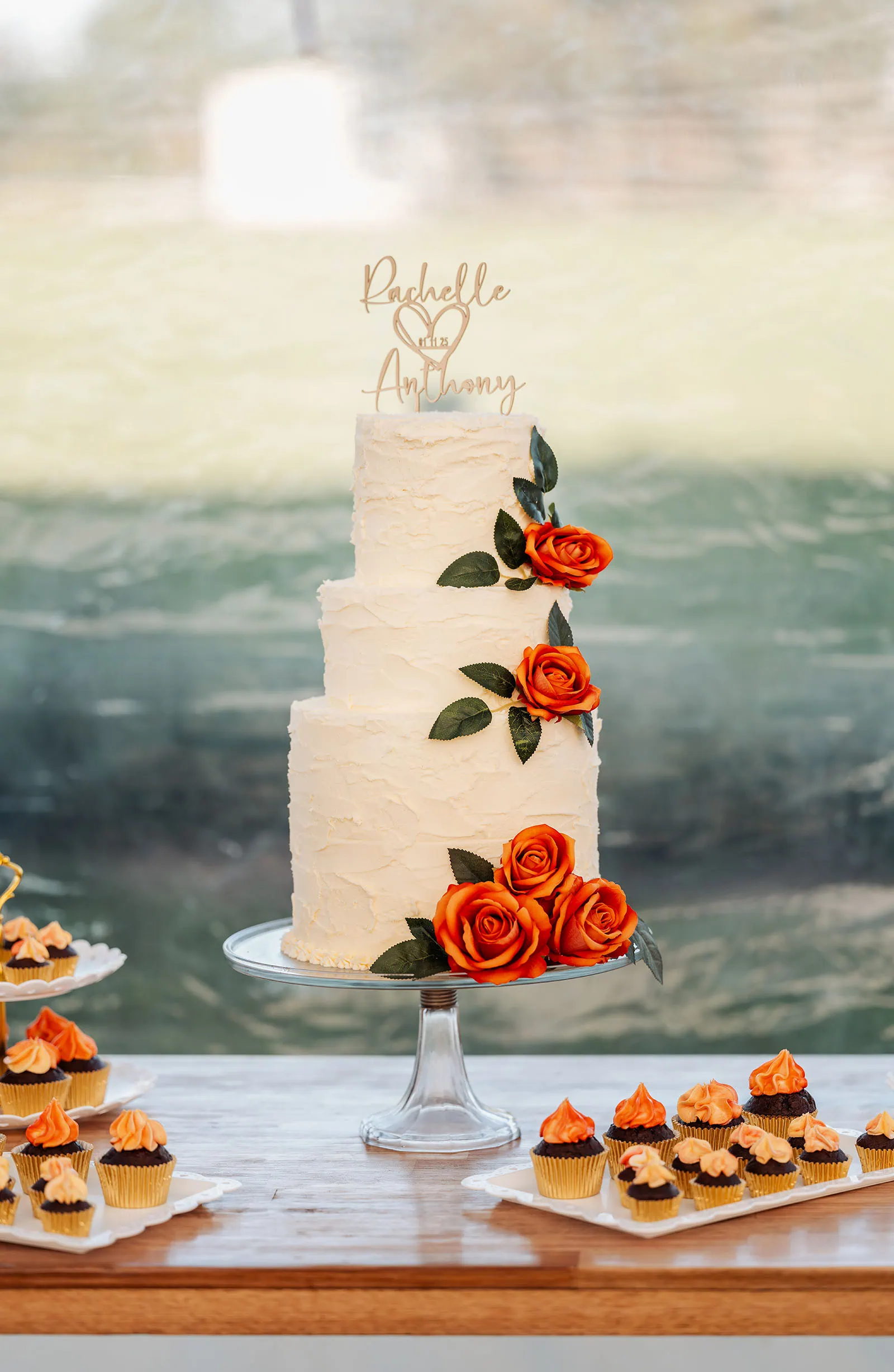 country victoria wedding in corrunnun – rachelle & anthony 363 Elegant wedding cake with floral decorations as centerpiece for reception.
