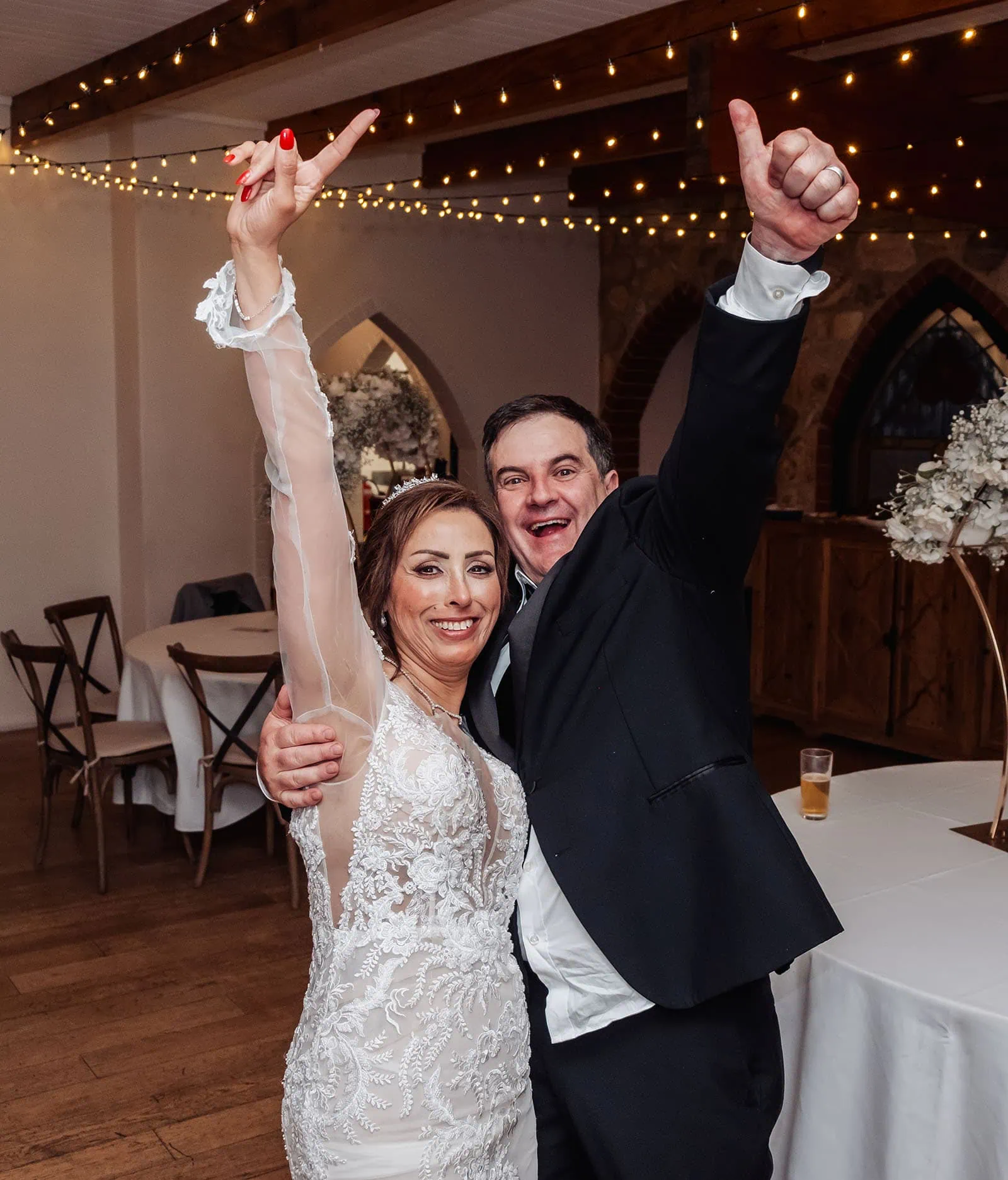 wedding at the manor in basket range - maryam & jason 177 Bride and groom joyfully celebrate their wedding with smiles and cheers.