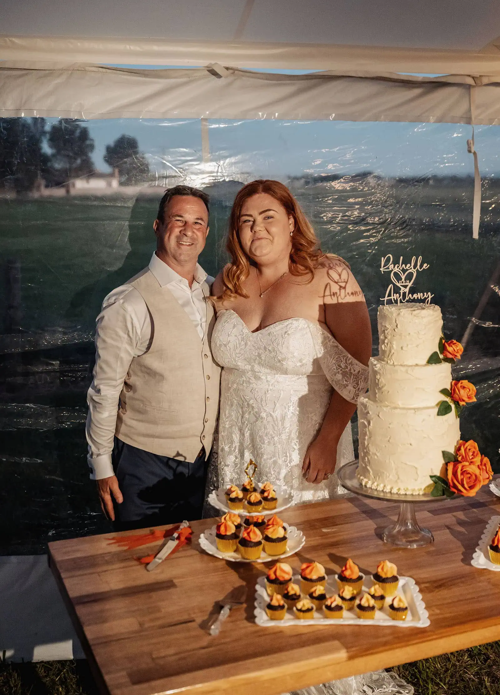 country victoria wedding in corrunnun – rachelle & anthony 366 Bride and groom cutting wedding cake at celebration.