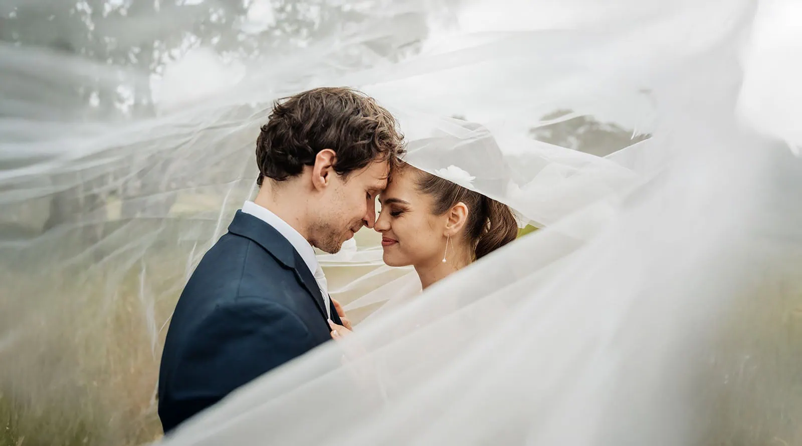 fleurieu cherries wedding - kimberley & richard 37 Wedding couple shares romantic embrace, capturing love and joy on their special day.